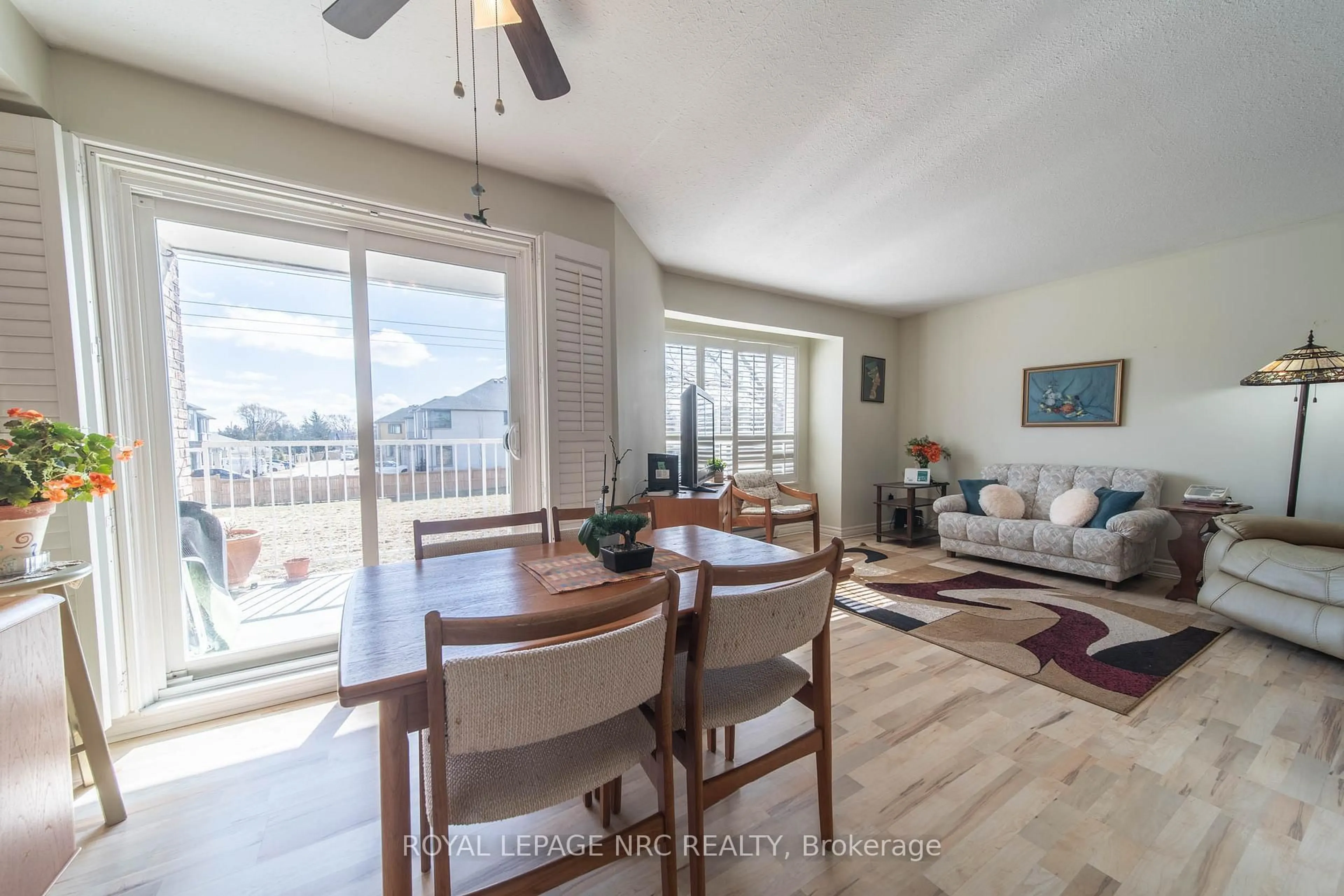 Dining room, wood/laminate floor for 1061 Vansickle Rd #202B, St. Catharines Ontario L2S 2X4
