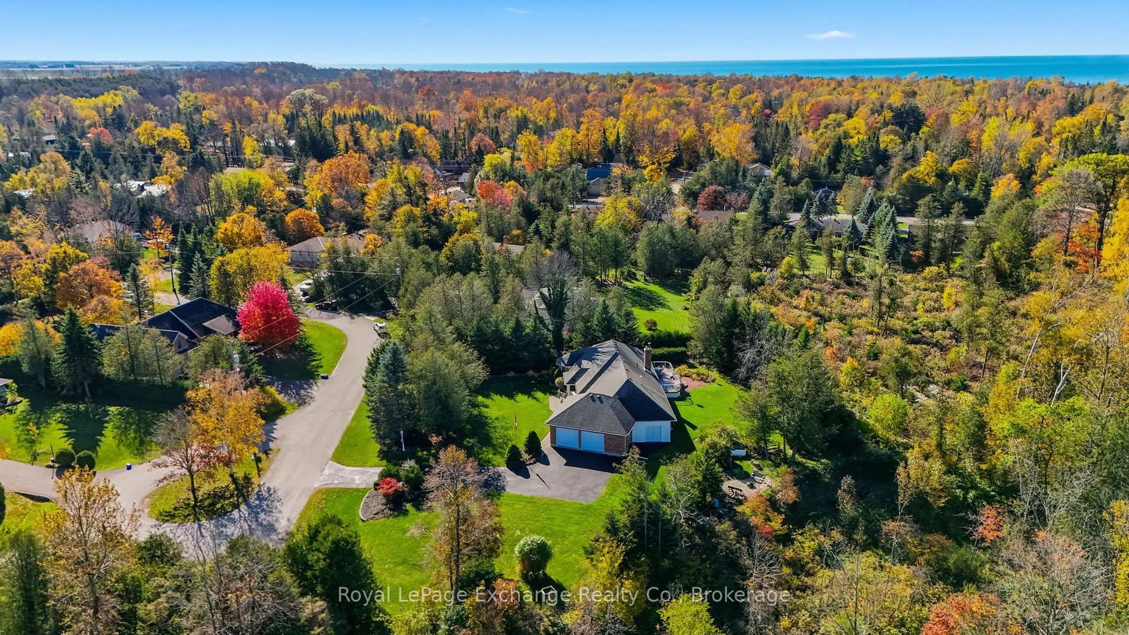 A pic from outside/outdoor area/front of a property/back of a property/a pic from drone, water/lake/river/ocean view for 115 Deerhurst Dr, Huron-Kinloss Ontario N2Z 2X3