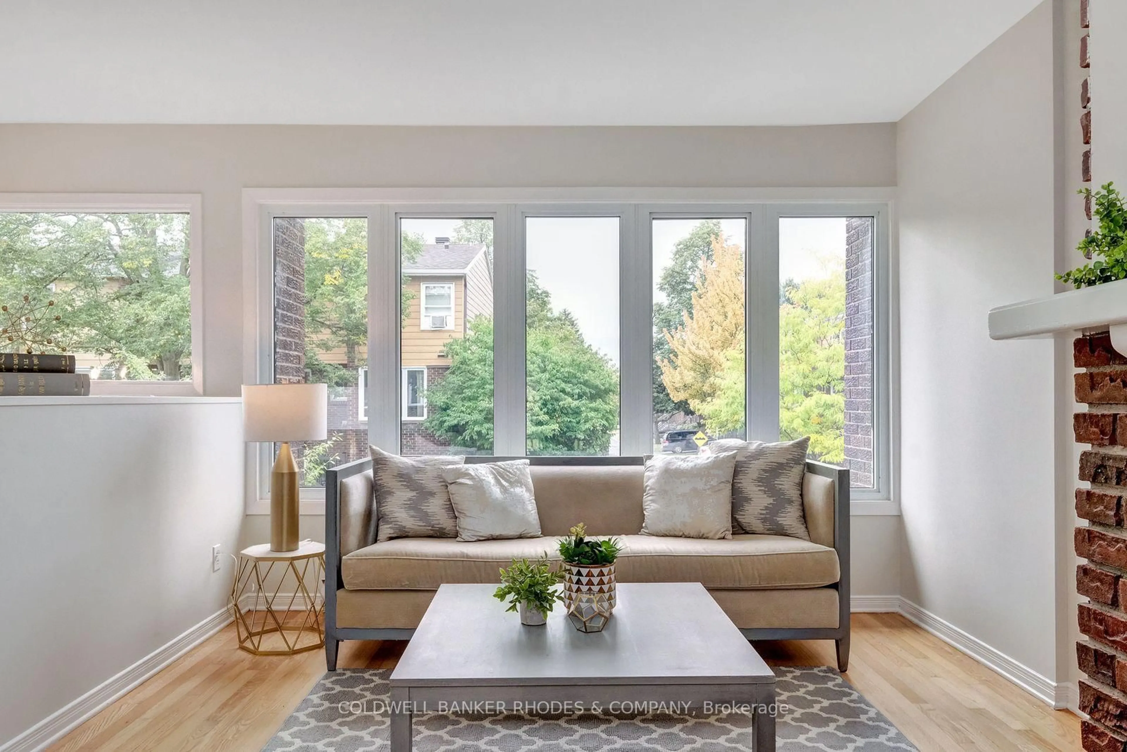 Living room with furniture, wood/laminate floor for 2098 Eric Cres, Ottawa Ontario K1B 4P4