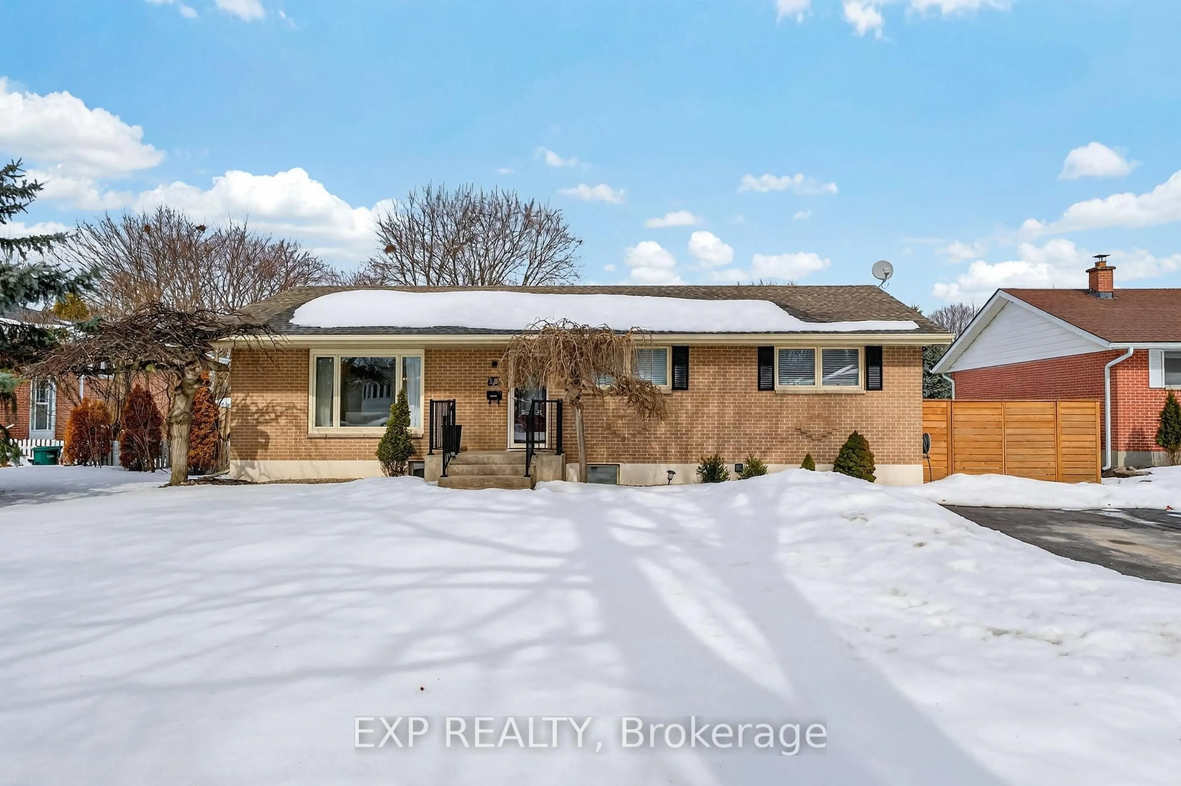 Home with brick exterior material, street for 11 Hampstead Heath, Kingston Ontario K7M 3J6
