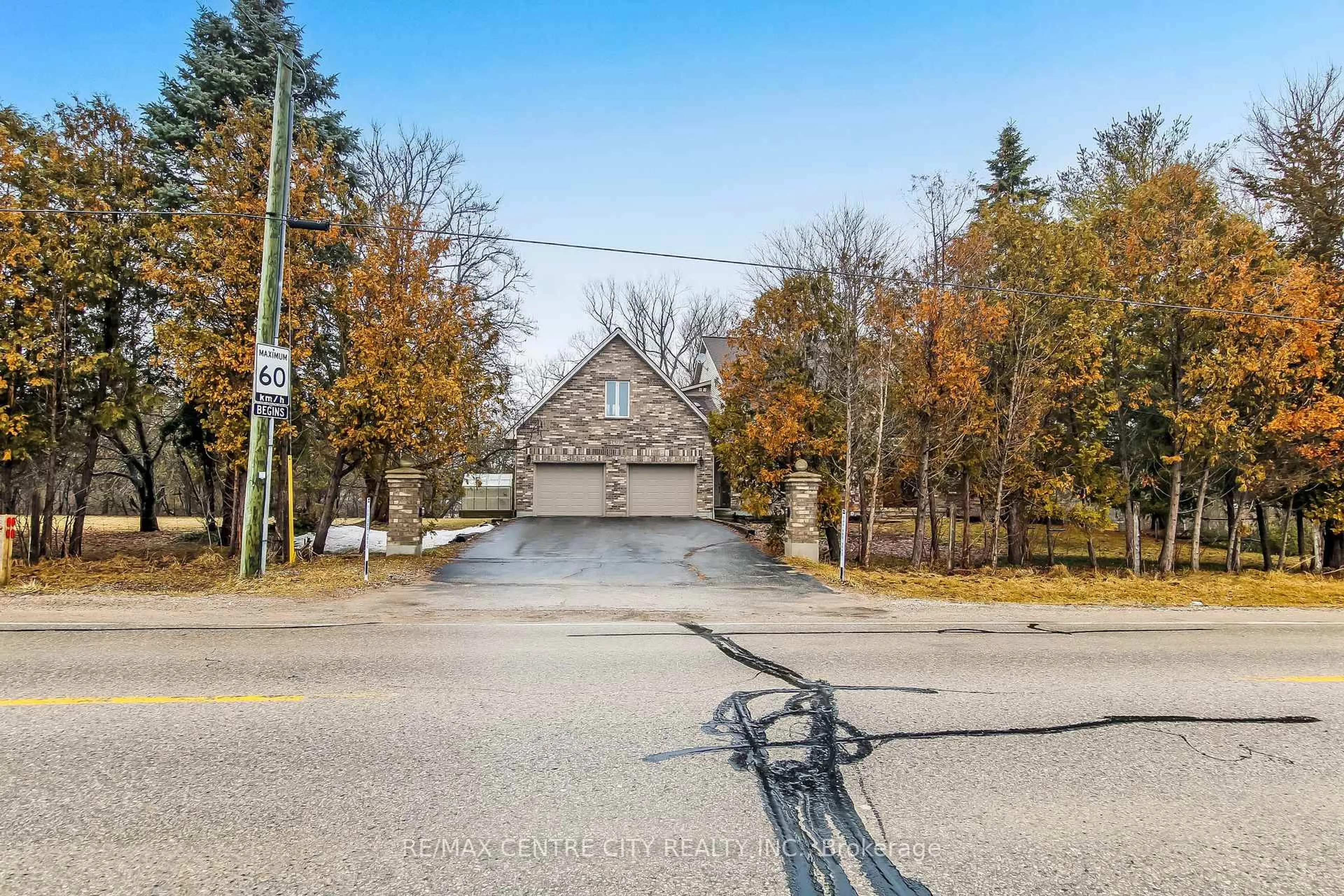 A pic from outside/outdoor area/front of a property/back of a property/a pic from drone, street for 1496 Sunningdale Rd, London North Ontario N5X 3Y6