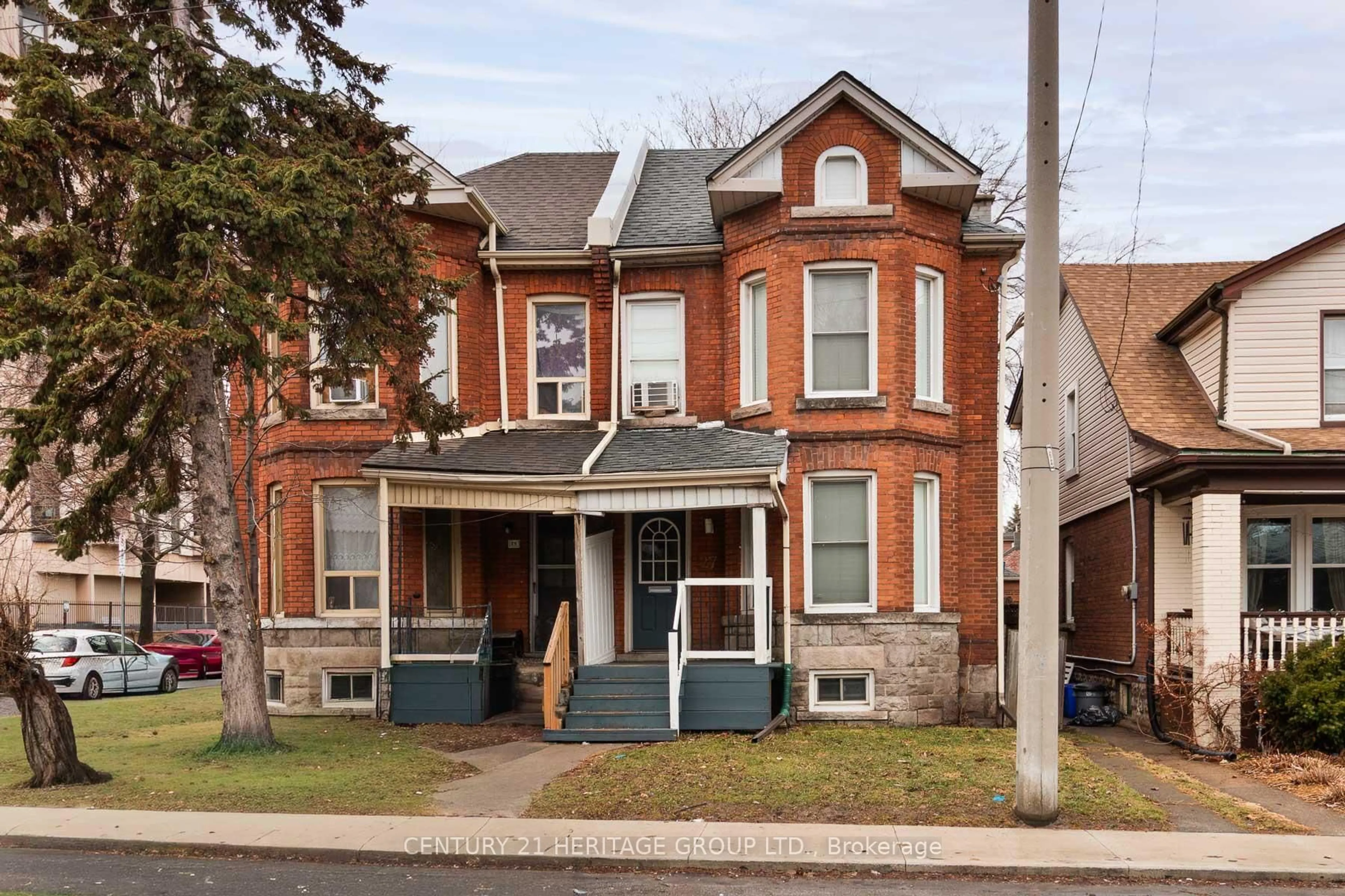 Home with brick exterior material, street for 27 Tisdale St, Hamilton Ontario L8L 5M3