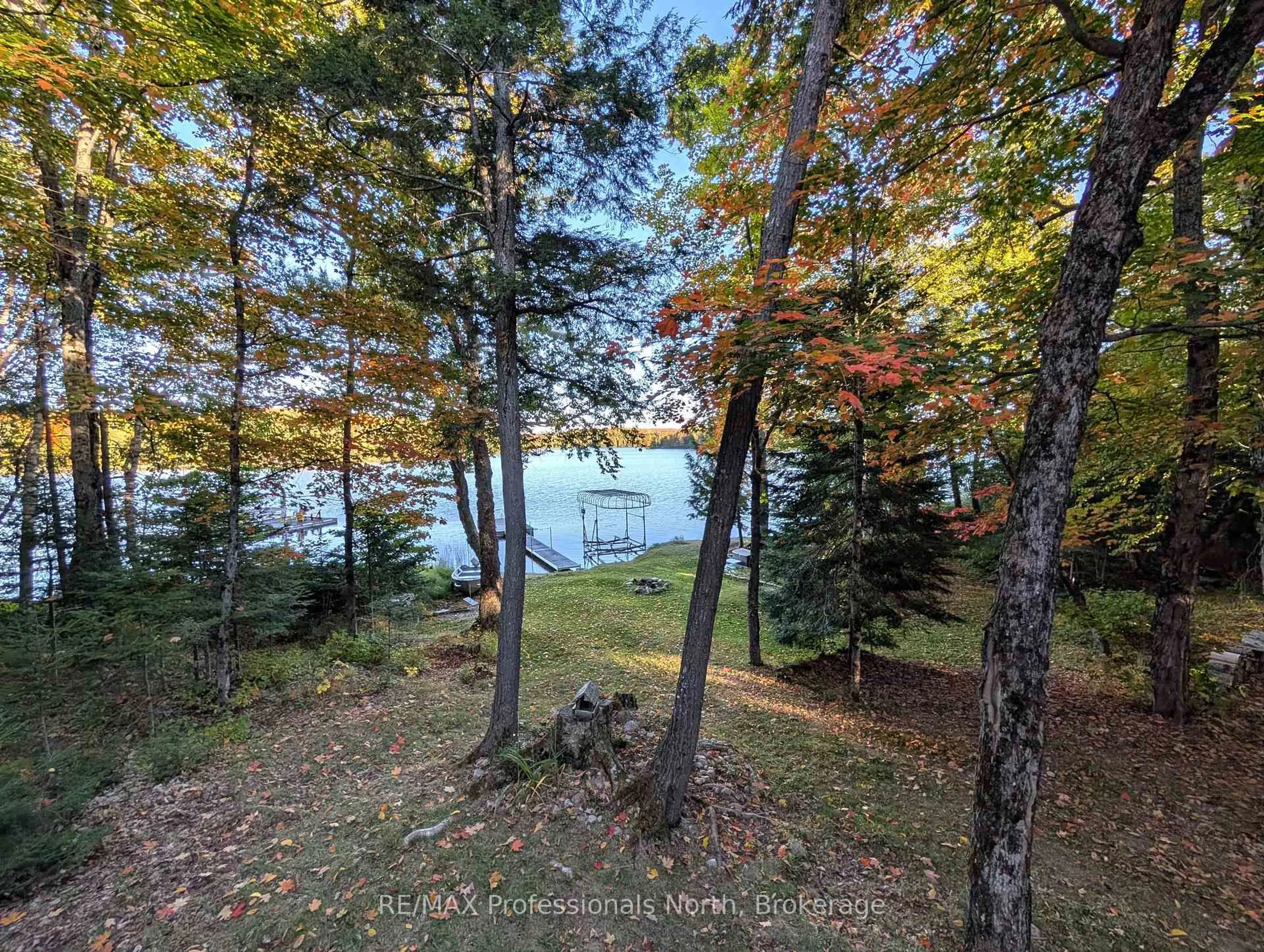 A pic from outside/outdoor area/front of a property/back of a property/a pic from drone, water/lake/river/ocean view for 1179 Spring Lake Rd, Parry Sound Remote Area Ontario P0A 1X0