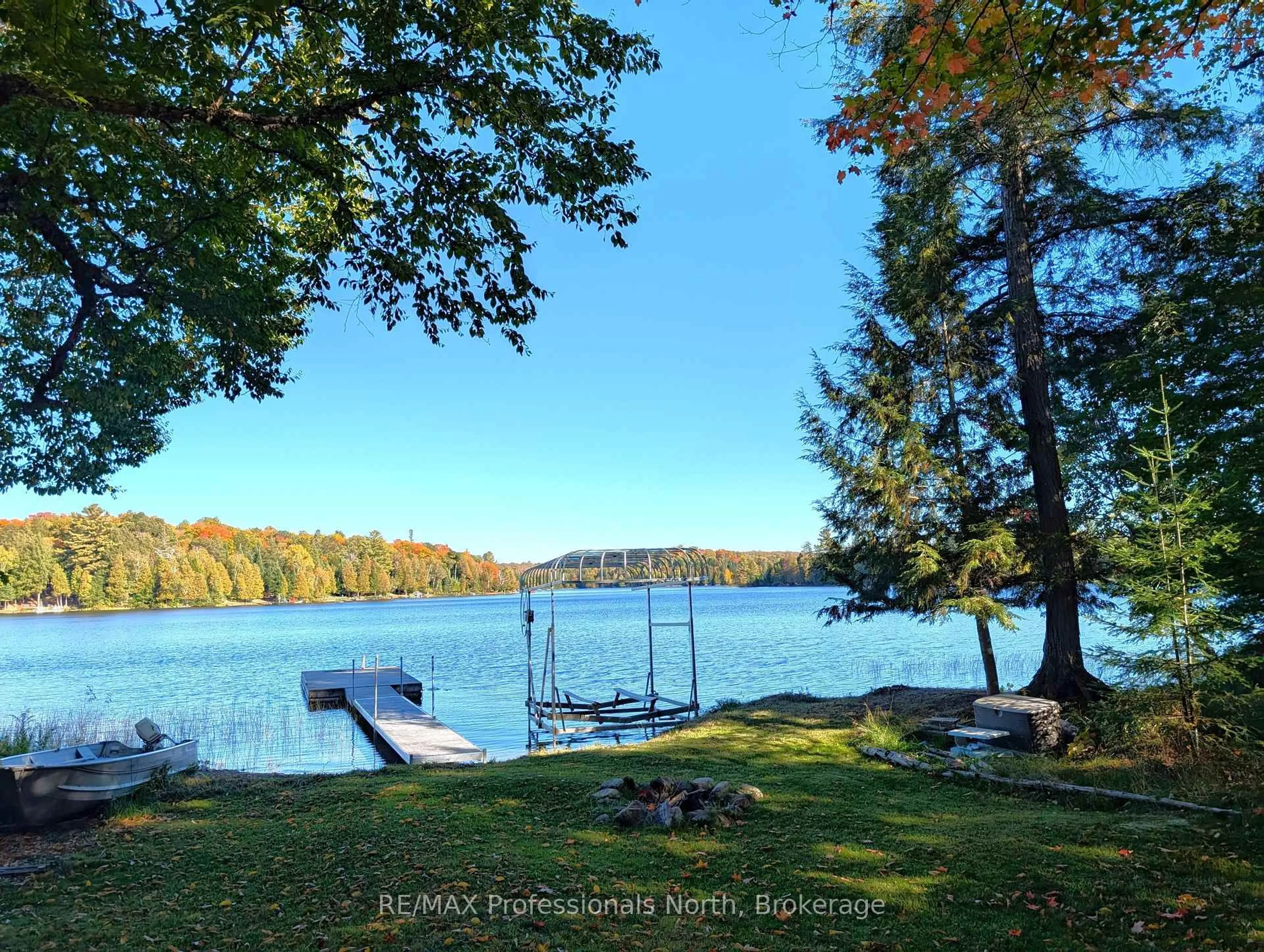 A pic from outside/outdoor area/front of a property/back of a property/a pic from drone, water/lake/river/ocean view for 1179 Spring Lake Rd, Parry Sound Remote Area Ontario P0A 1X0