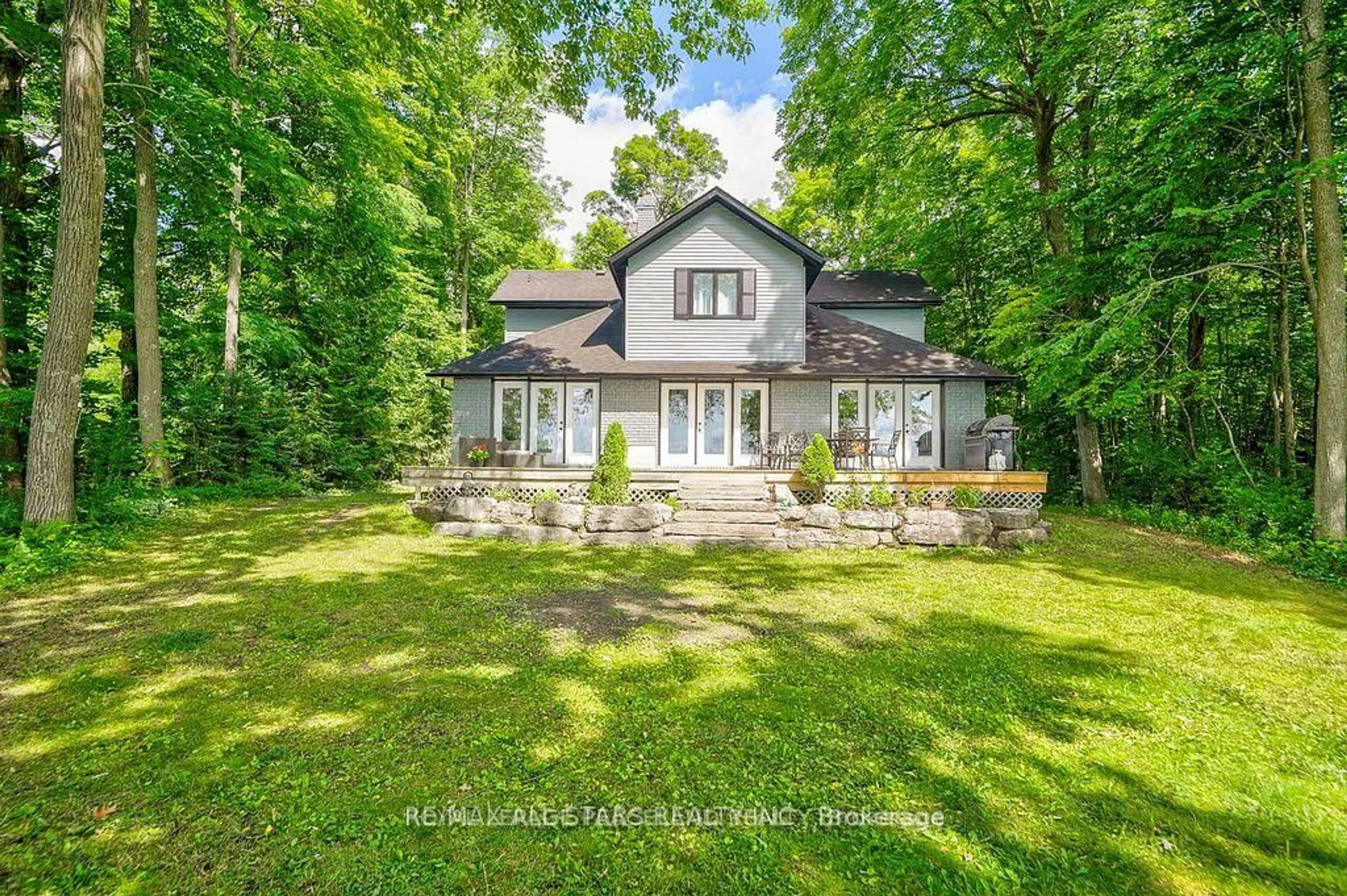A pic from outside/outdoor area/front of a property/back of a property/a pic from drone, unknown for 317 Riverside Dr, Kawartha Lakes Ontario K0M 1A0