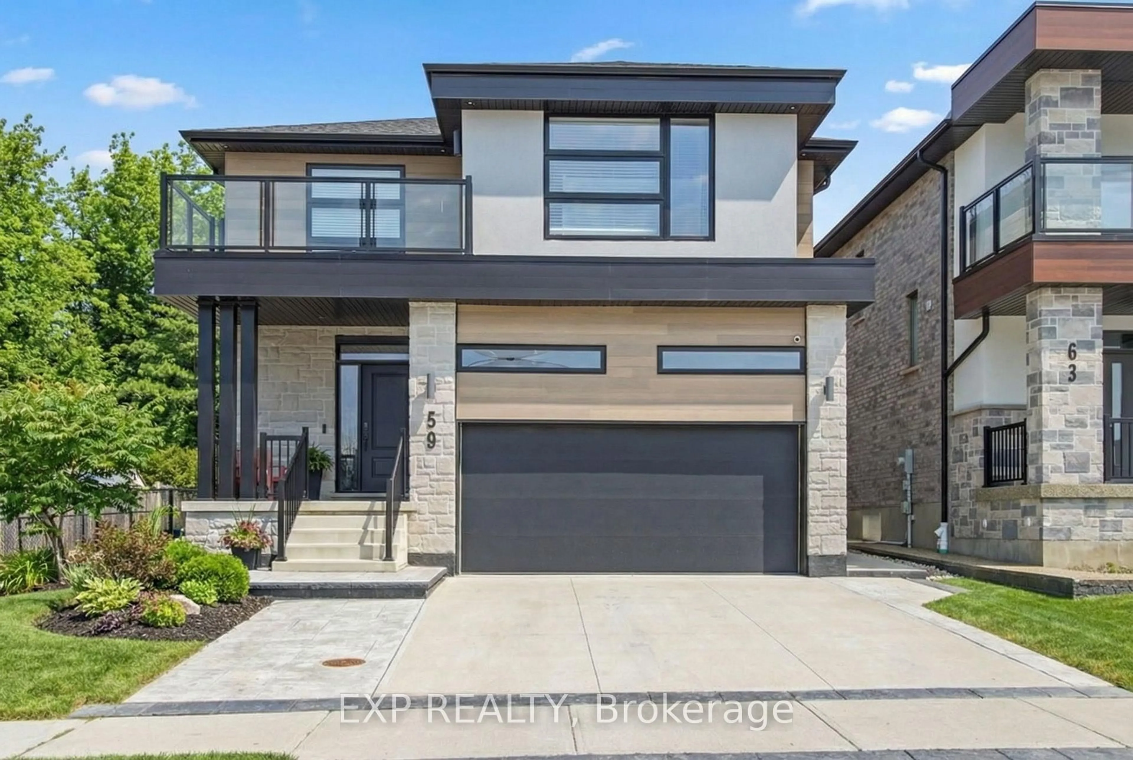 Home with brick exterior material, street for 59 Monarch Woods Dr, Kitchener Ontario N2P 0K1