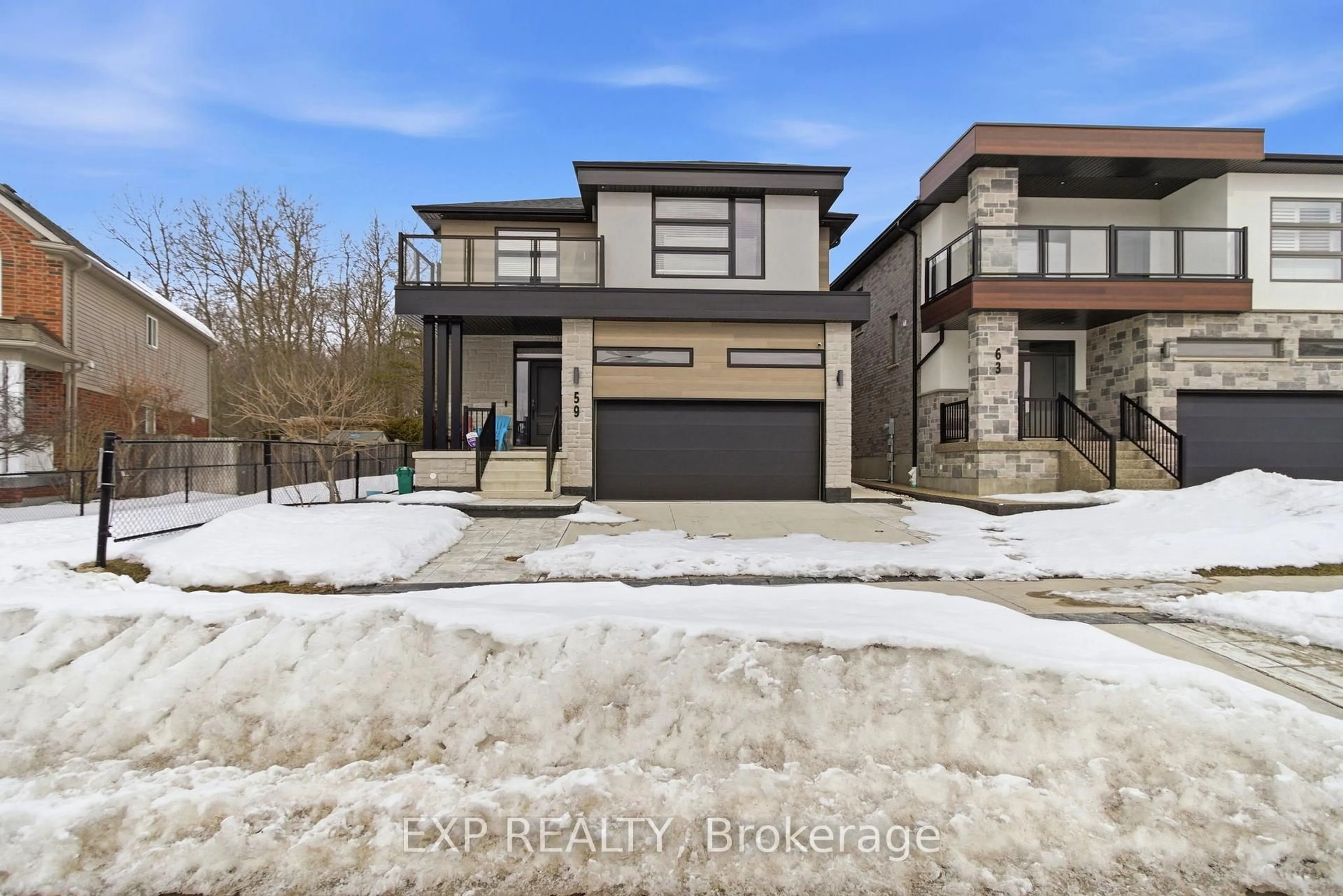 Home with brick exterior material, street for 59 Monarch Woods Dr, Kitchener Ontario N2P 0K1