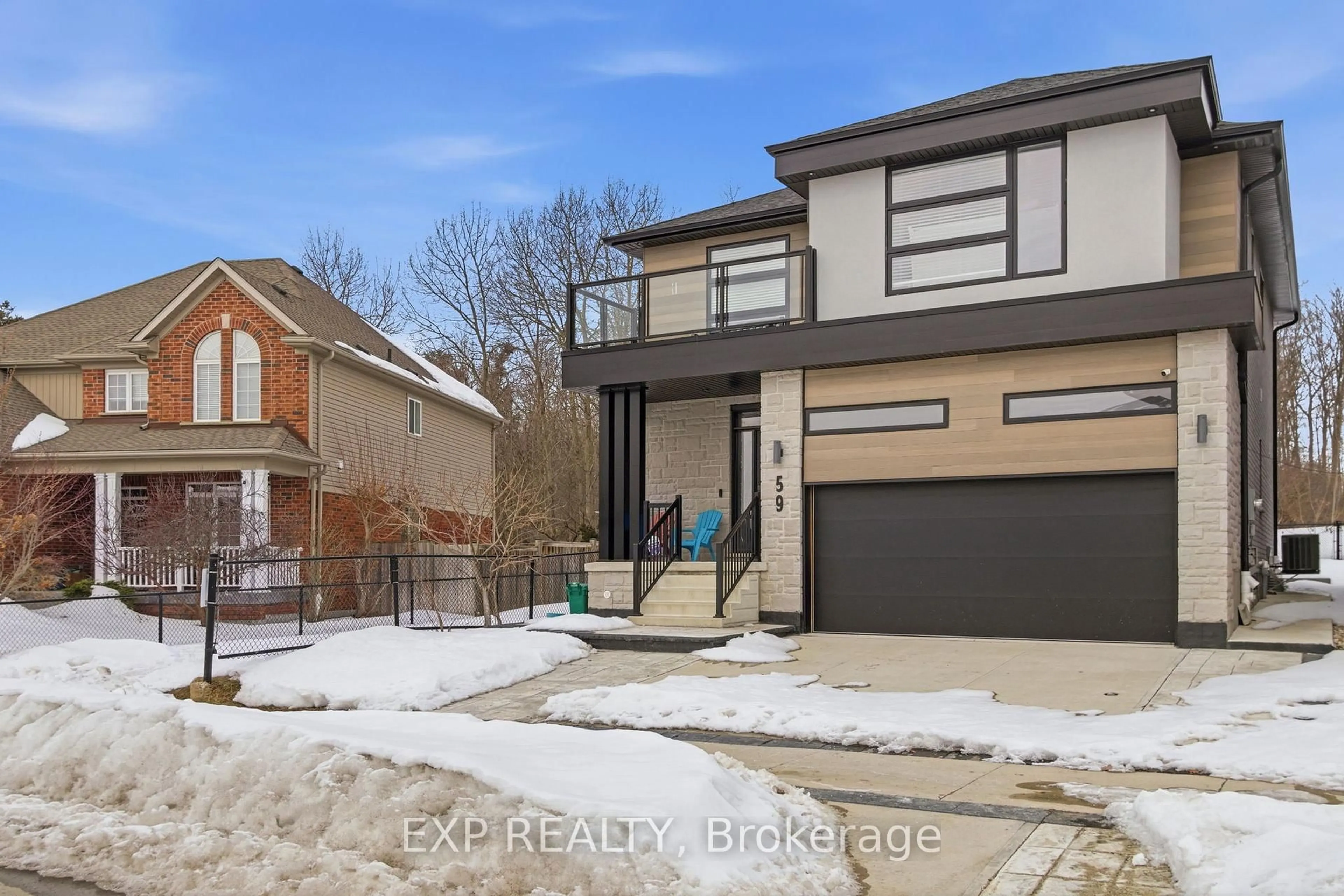 Home with brick exterior material, street for 59 Monarch Woods Dr, Kitchener Ontario N2P 0K1