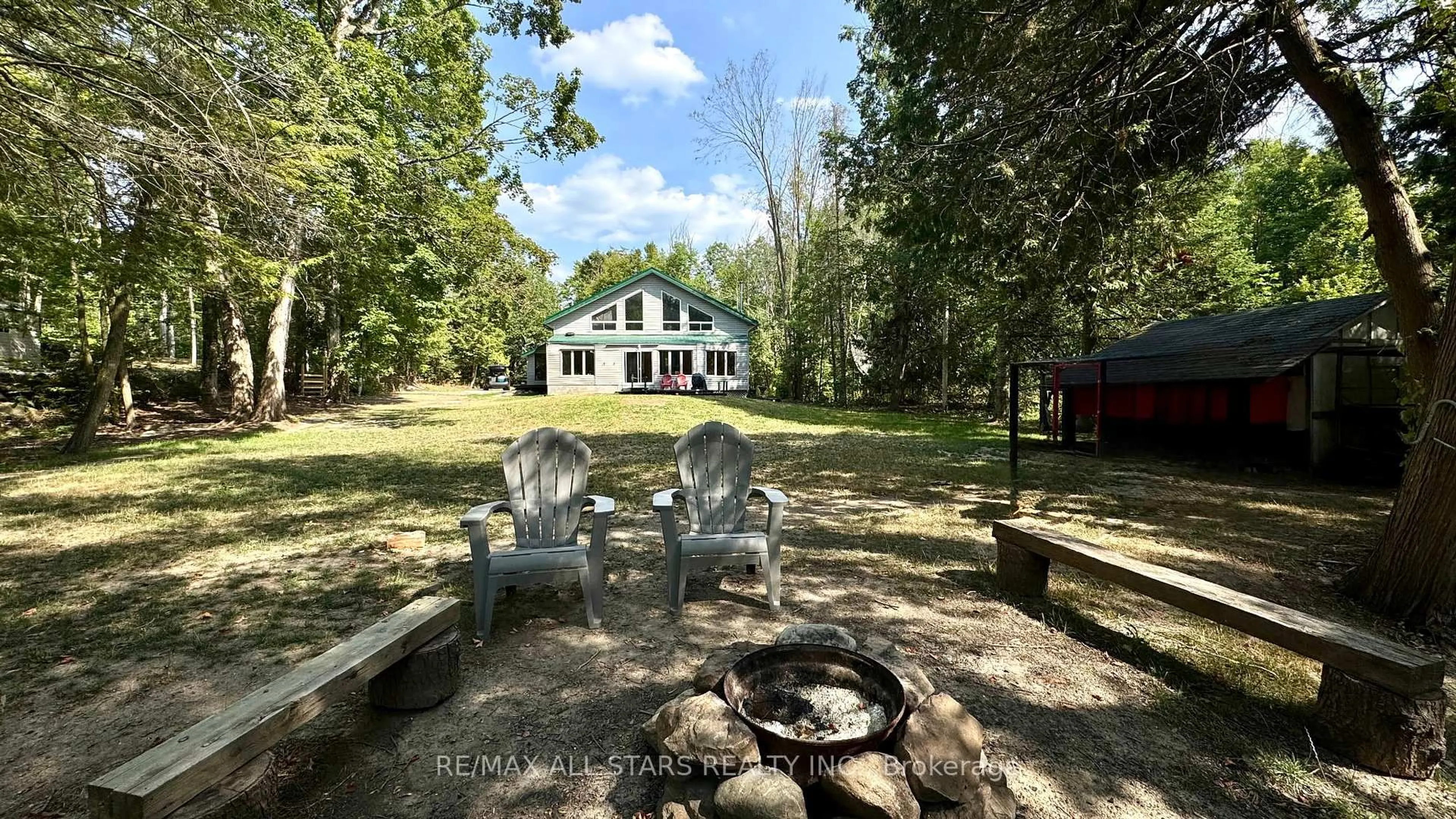 A pic from outside/outdoor area/front of a property/back of a property/a pic from drone, water/lake/river/ocean view for 398 Edwina Dr, Trent Lakes Ontario K0M 1A0