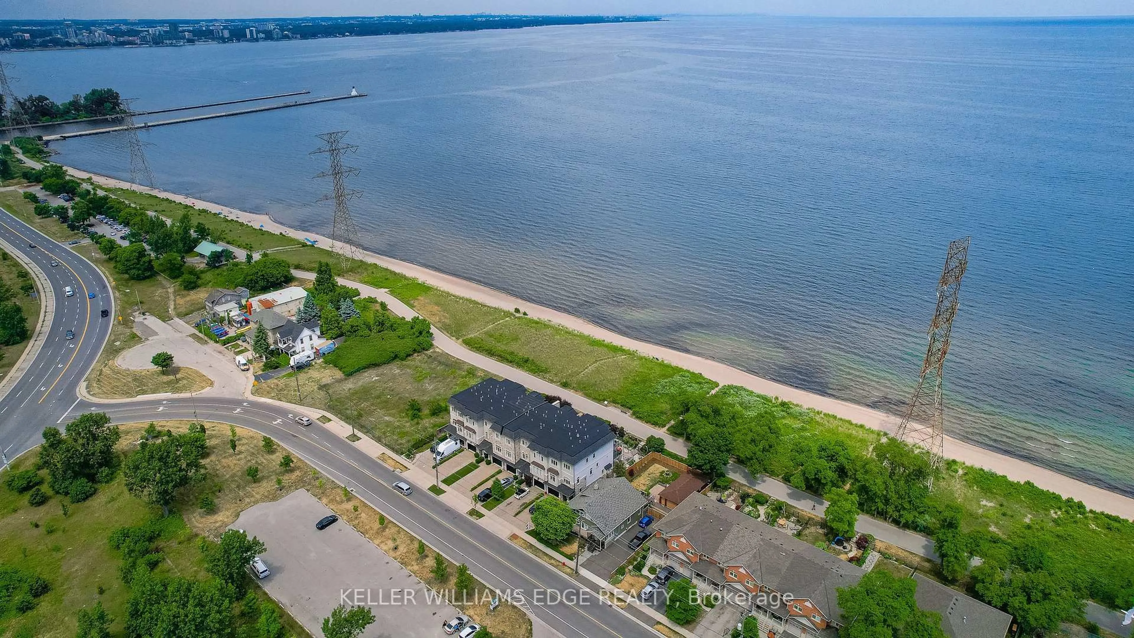 A pic from outside/outdoor area/front of a property/back of a property/a pic from drone, water/lake/river/ocean view for 1081 Beach Blvd, Hamilton Ontario L8H 6Z9