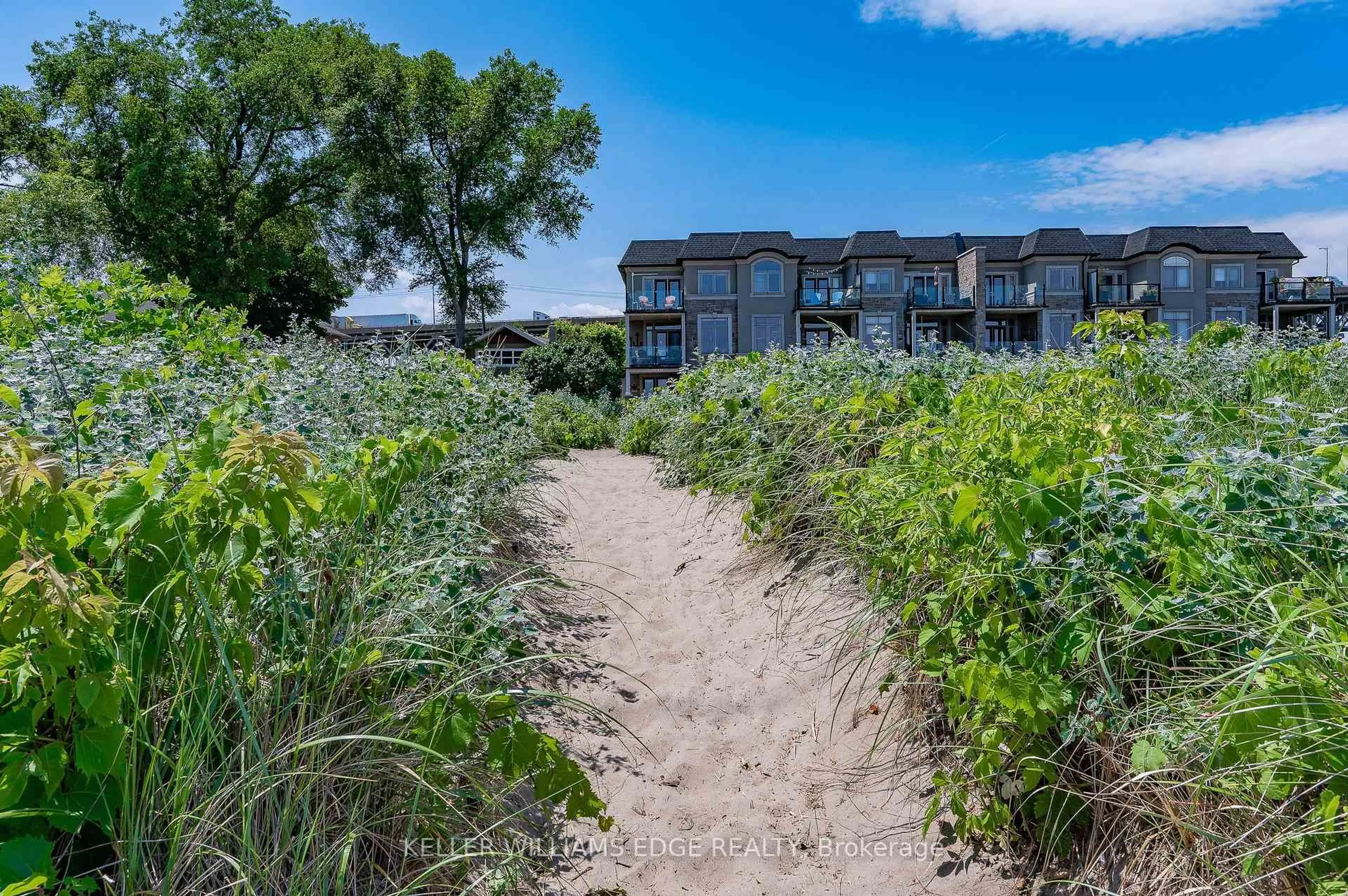 A pic from outside/outdoor area/front of a property/back of a property/a pic from drone, water/lake/river/ocean view for 1081 Beach Blvd, Hamilton Ontario L8H 6Z9