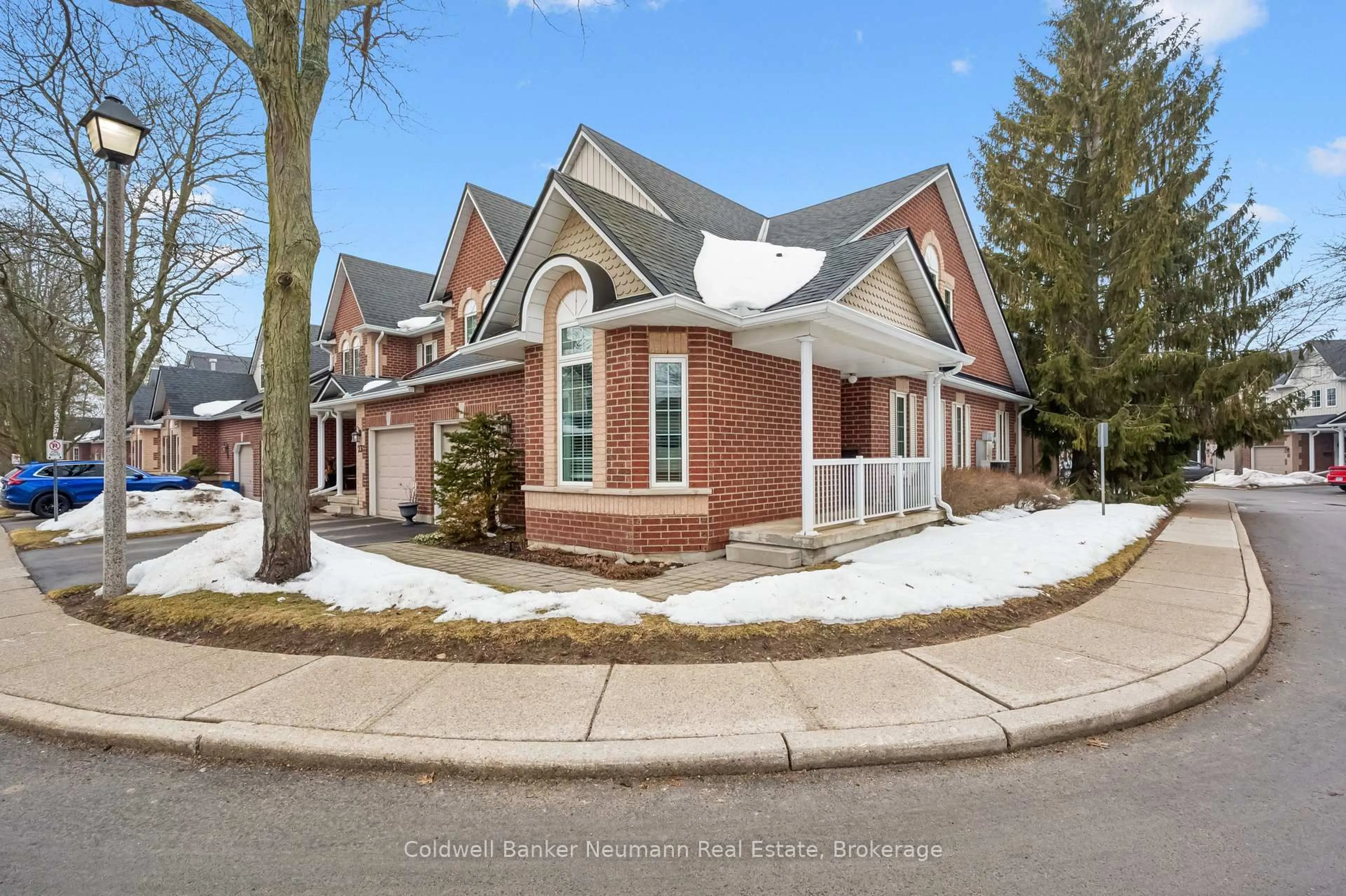 Home with brick exterior material, street for 60 Ptarmigan Dr #22, Guelph Ontario N1C 1E5