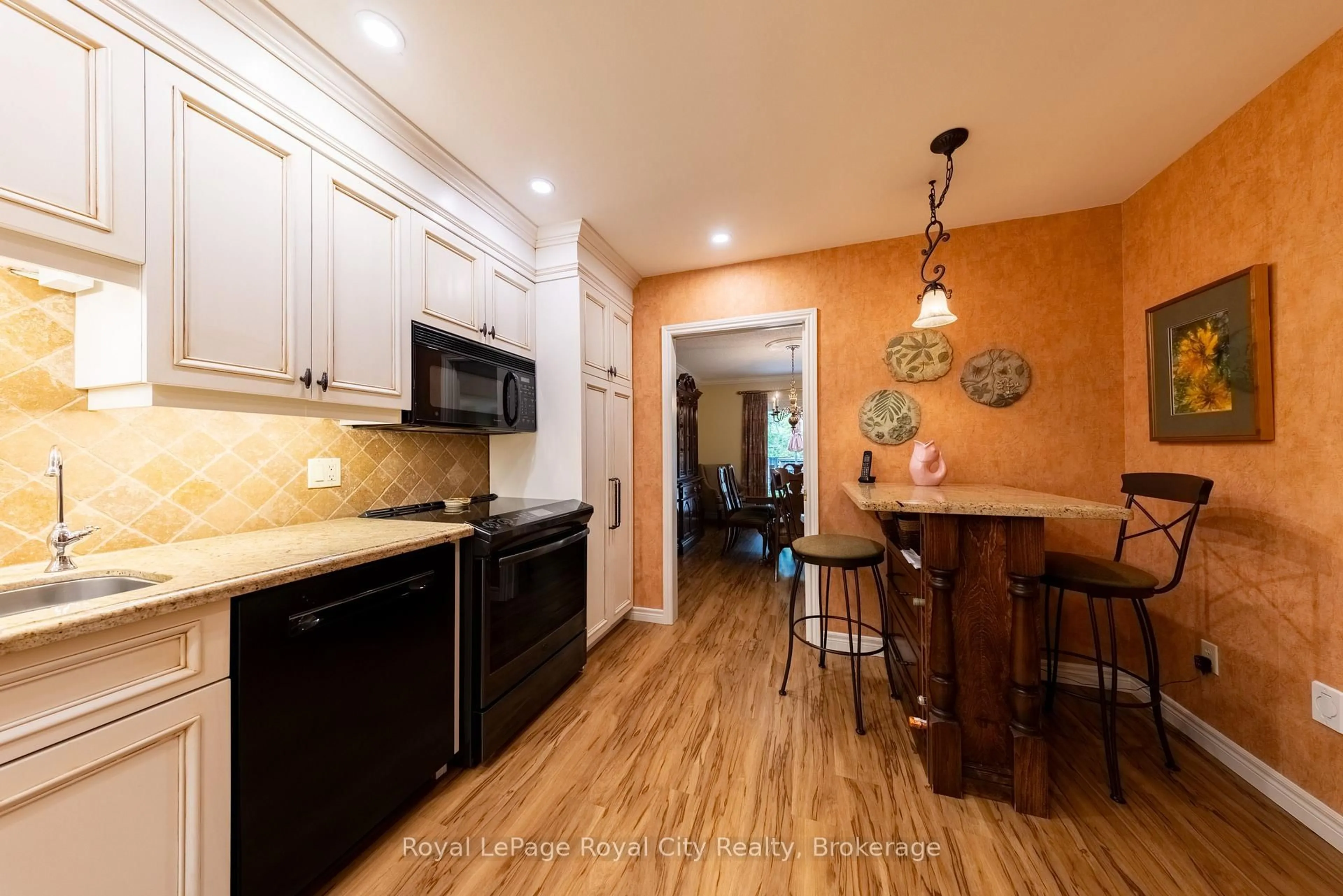 Open concept kitchen, ceramic/tile floor for 121 Waterloo Ave #101, Guelph Ontario N1H 3H9