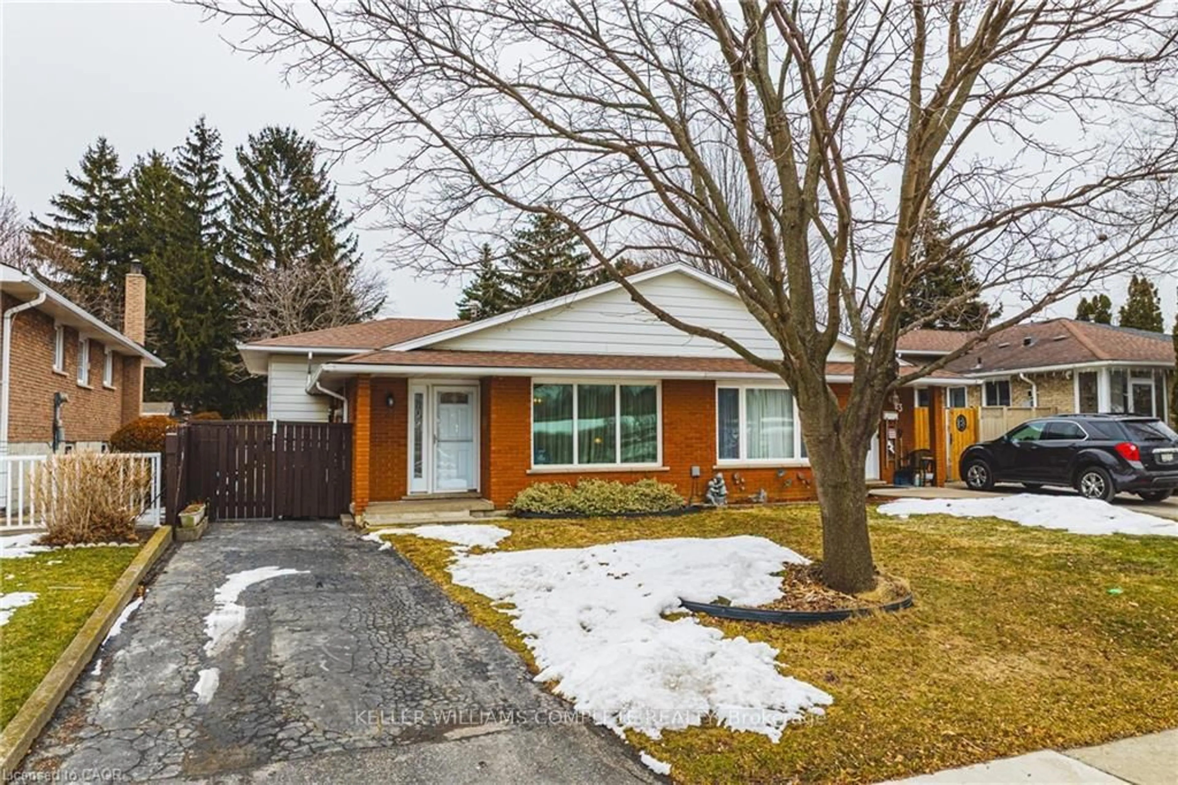 Home with brick exterior material, street for 21 LYNWOOD Rd, Hamilton Ontario L9C 6M7