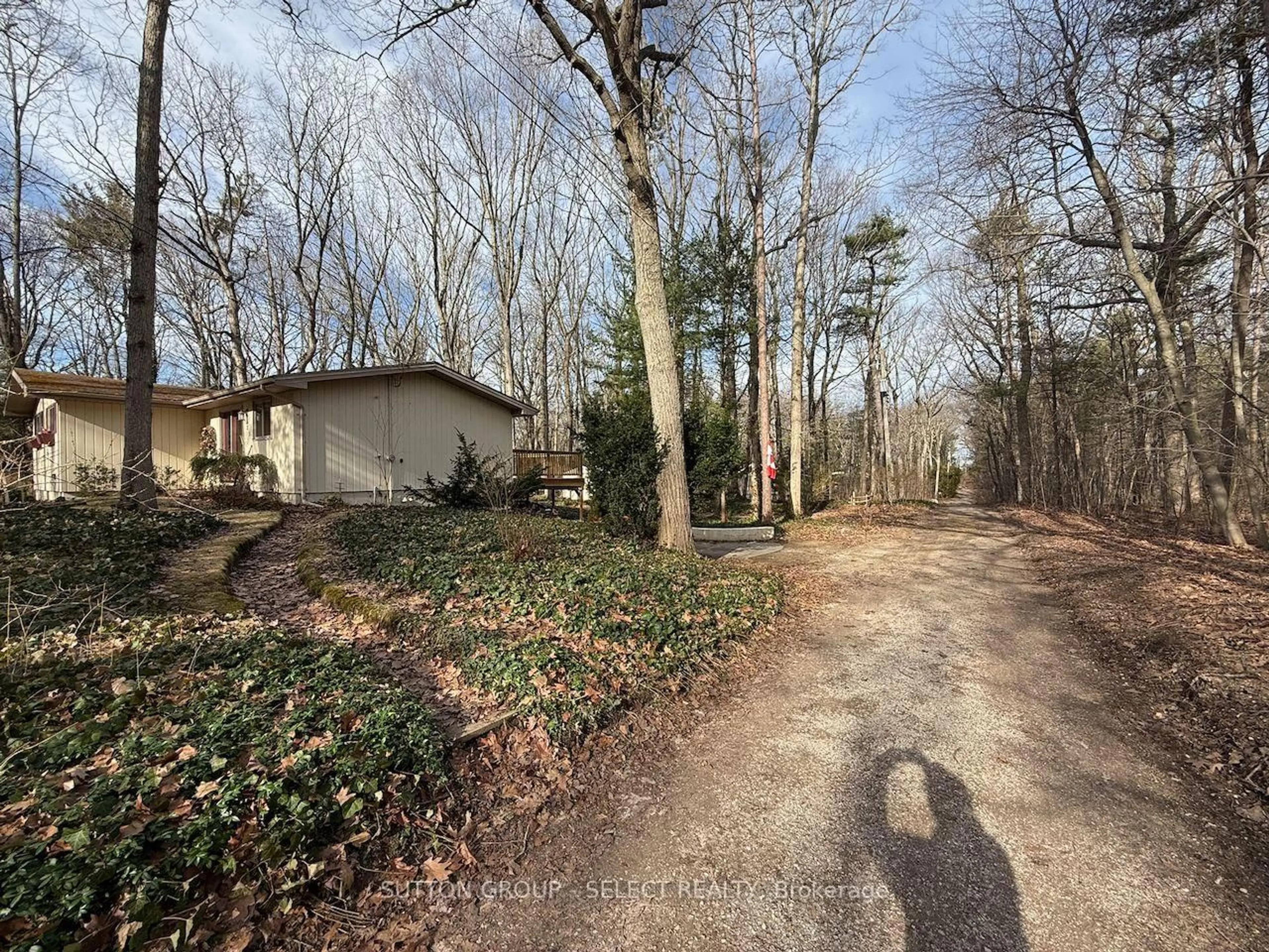 A pic from outside/outdoor area/front of a property/back of a property/a pic from drone, forest/trees view for 10296 Pines Pkwy, Lambton Shores Ontario N0M 1T0