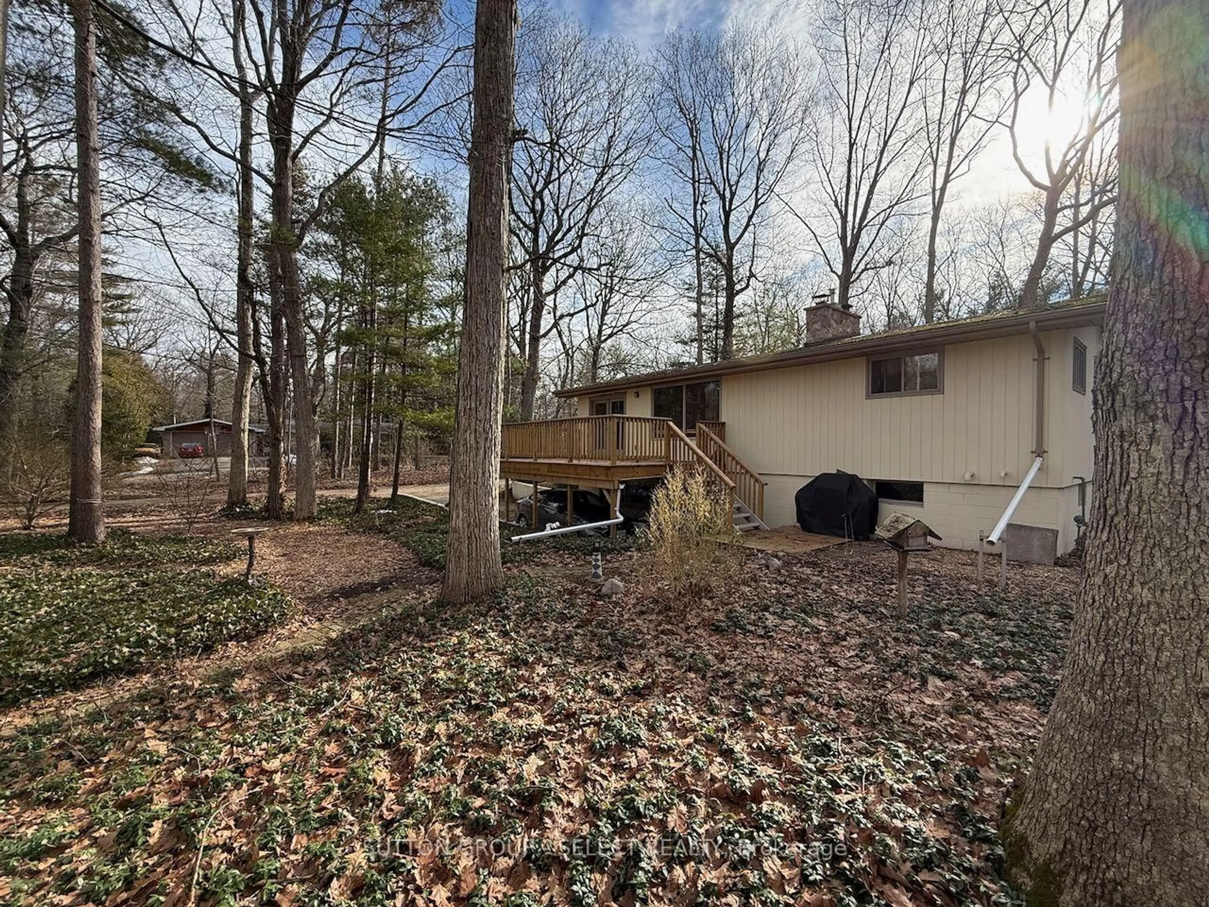 A pic from outside/outdoor area/front of a property/back of a property/a pic from drone, forest/trees view for 10296 Pines Pkwy, Lambton Shores Ontario N0M 1T0