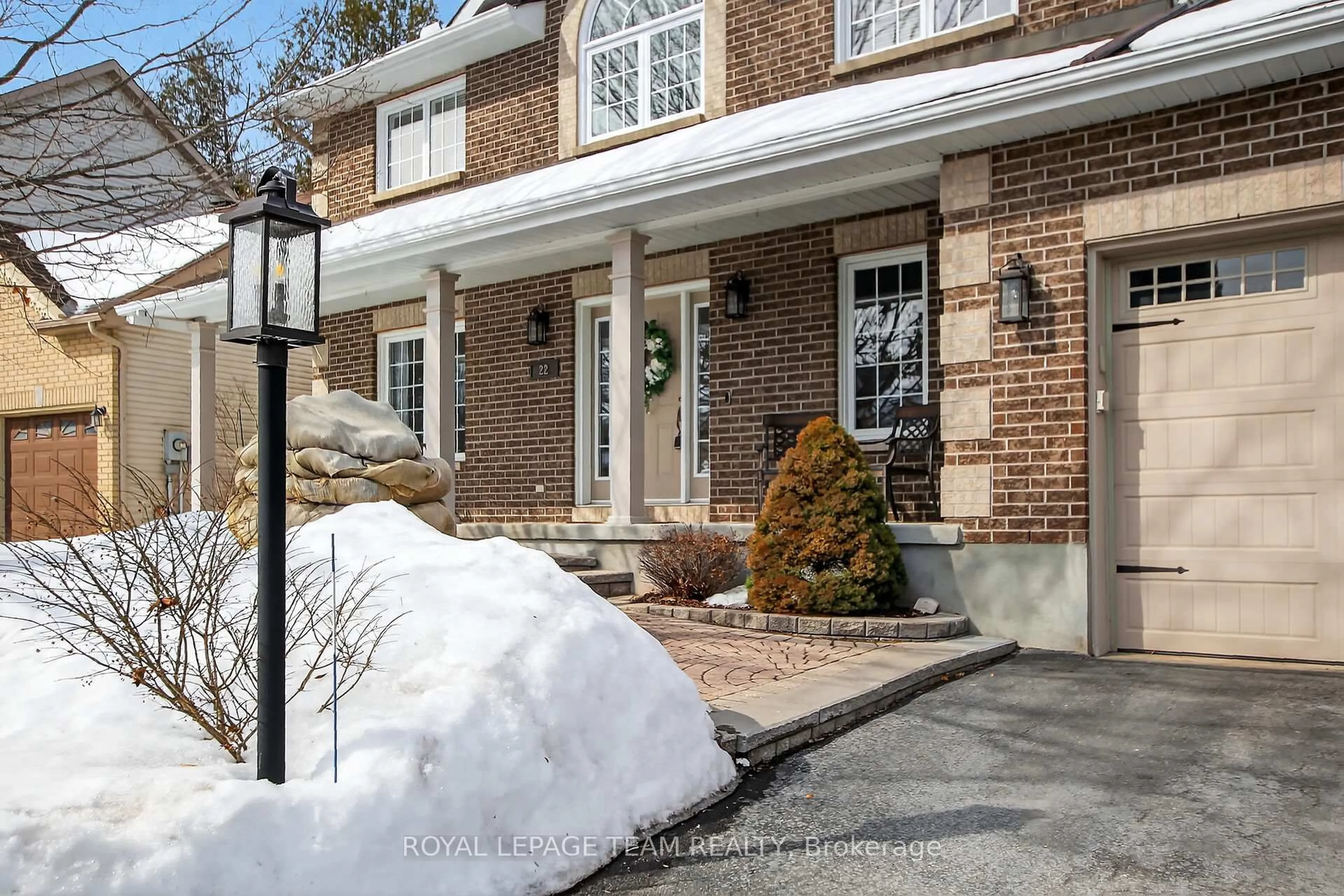 Home with brick exterior material, street for 22 Renshaw Ave, Stittsville Ontario K2S 1G9