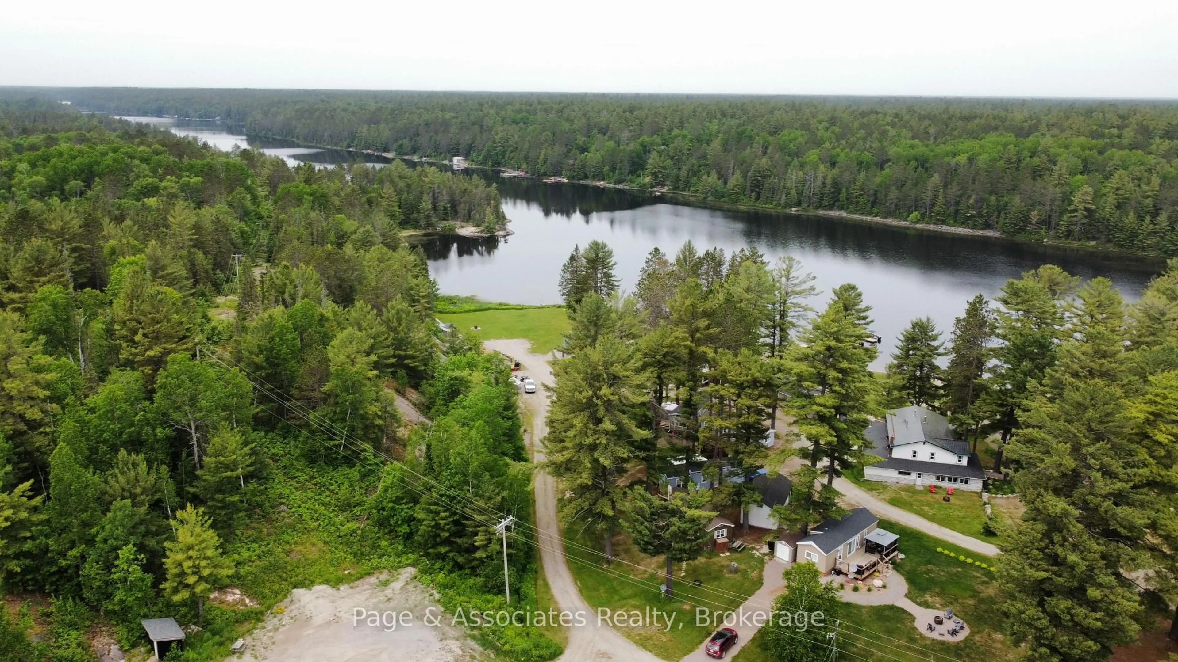 A pic from outside/outdoor area/front of a property/back of a property/a pic from drone, water/lake/river/ocean view for 120 Happy Landing Rd, French River Ontario P0M 2N0