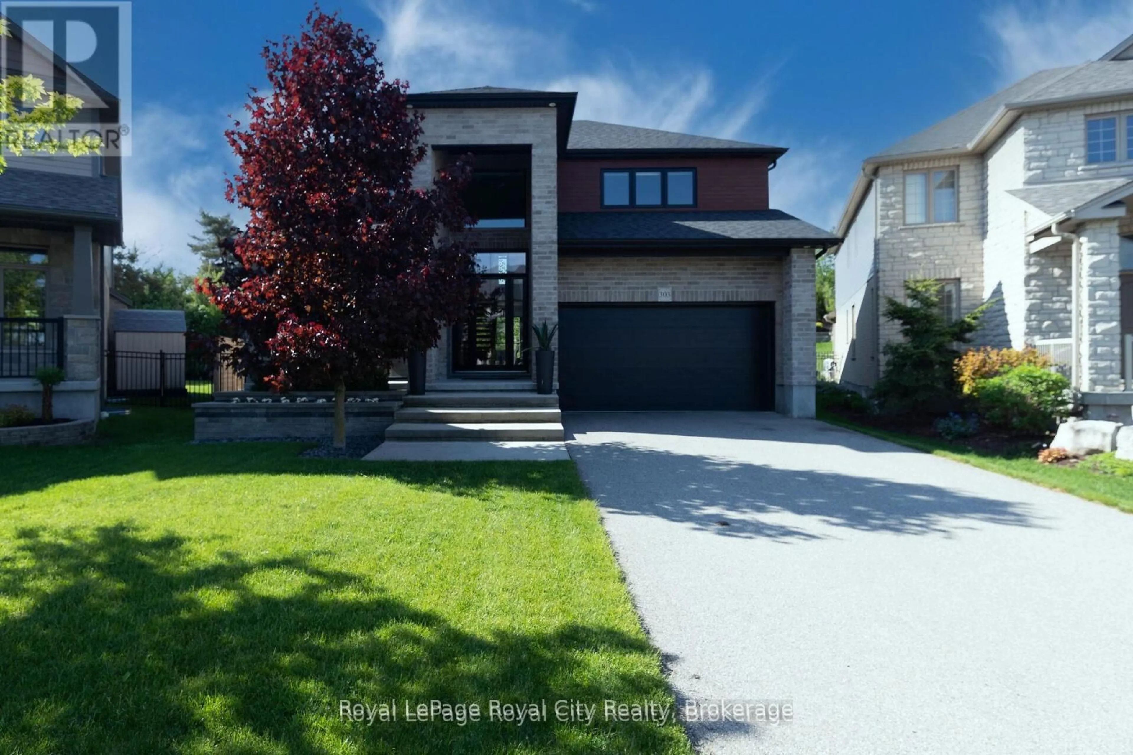 Home with brick exterior material, street for 303 Gosling Gdns, Guelph Ontario N1L 0M1