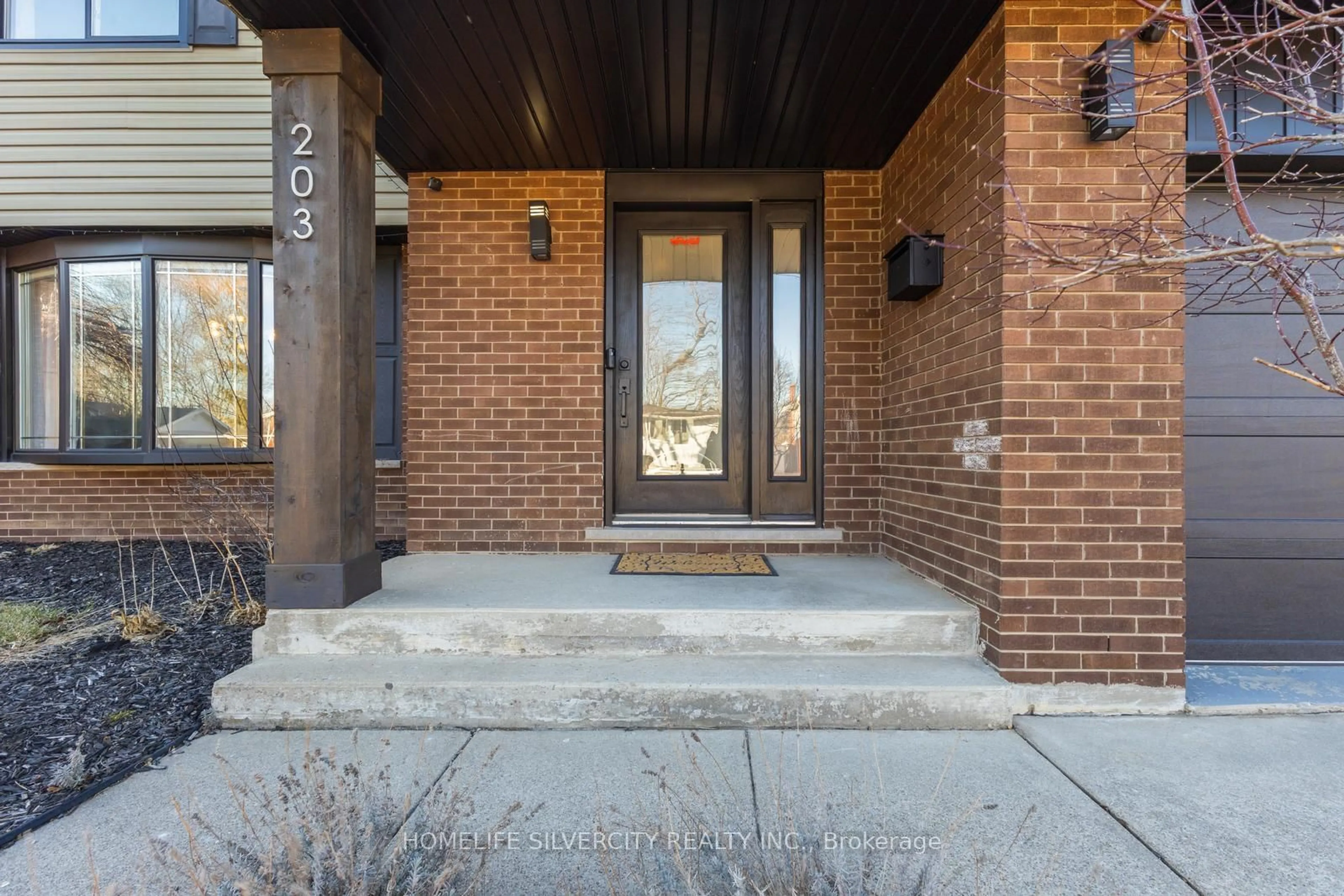 Home with brick exterior material, street for 203 Montmorency Dr, Hamilton Ontario L8K 5H3