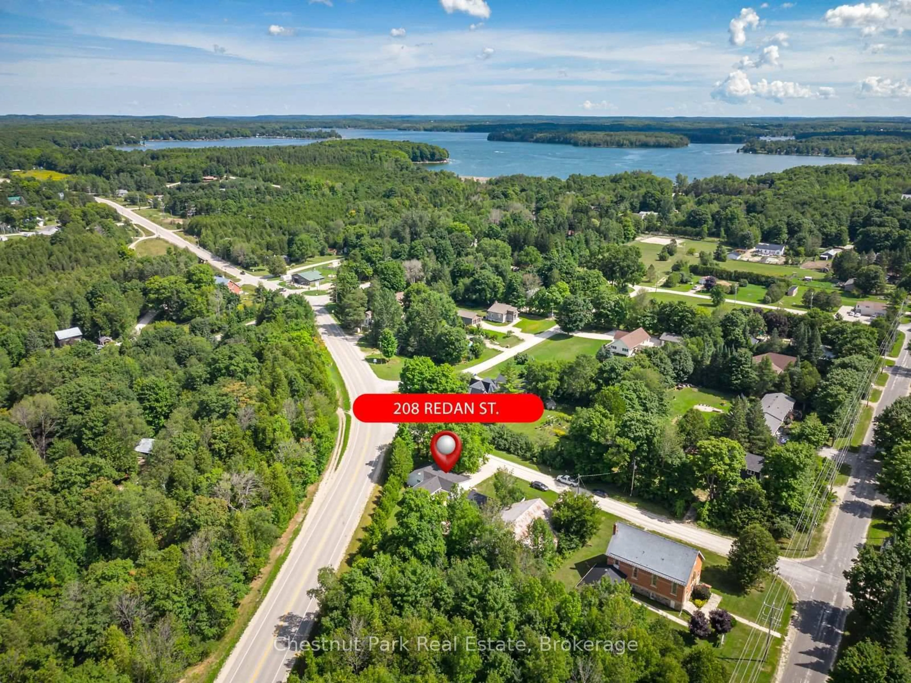 A pic from outside/outdoor area/front of a property/back of a property/a pic from drone, water/lake/river/ocean view for 208 Redan St, Grey Highlands Ontario N0C 1E0