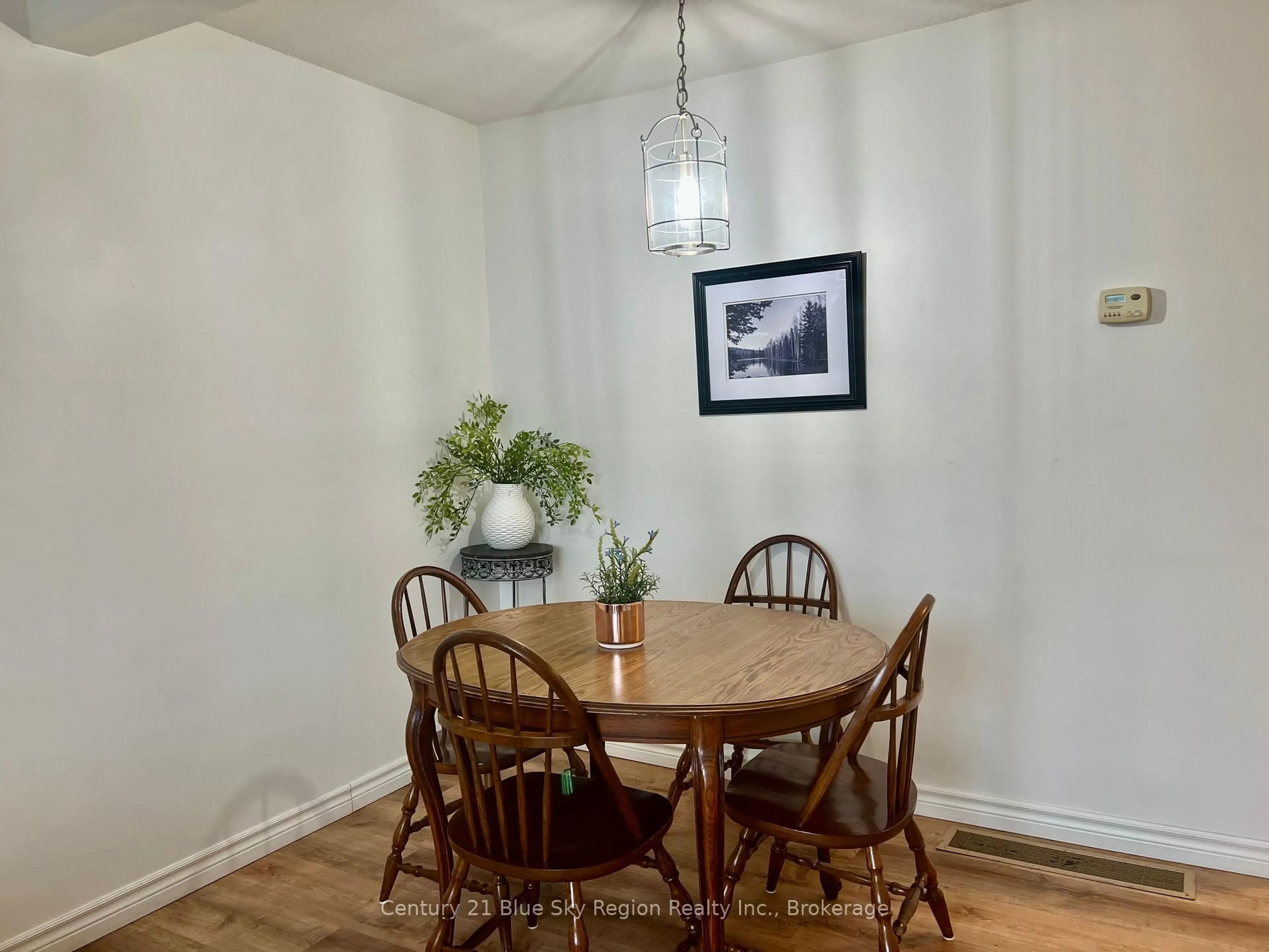 Dining room, wood/laminate floor for 450 Lakeshore Dr #A4, North Bay Ontario P1A 2E1
