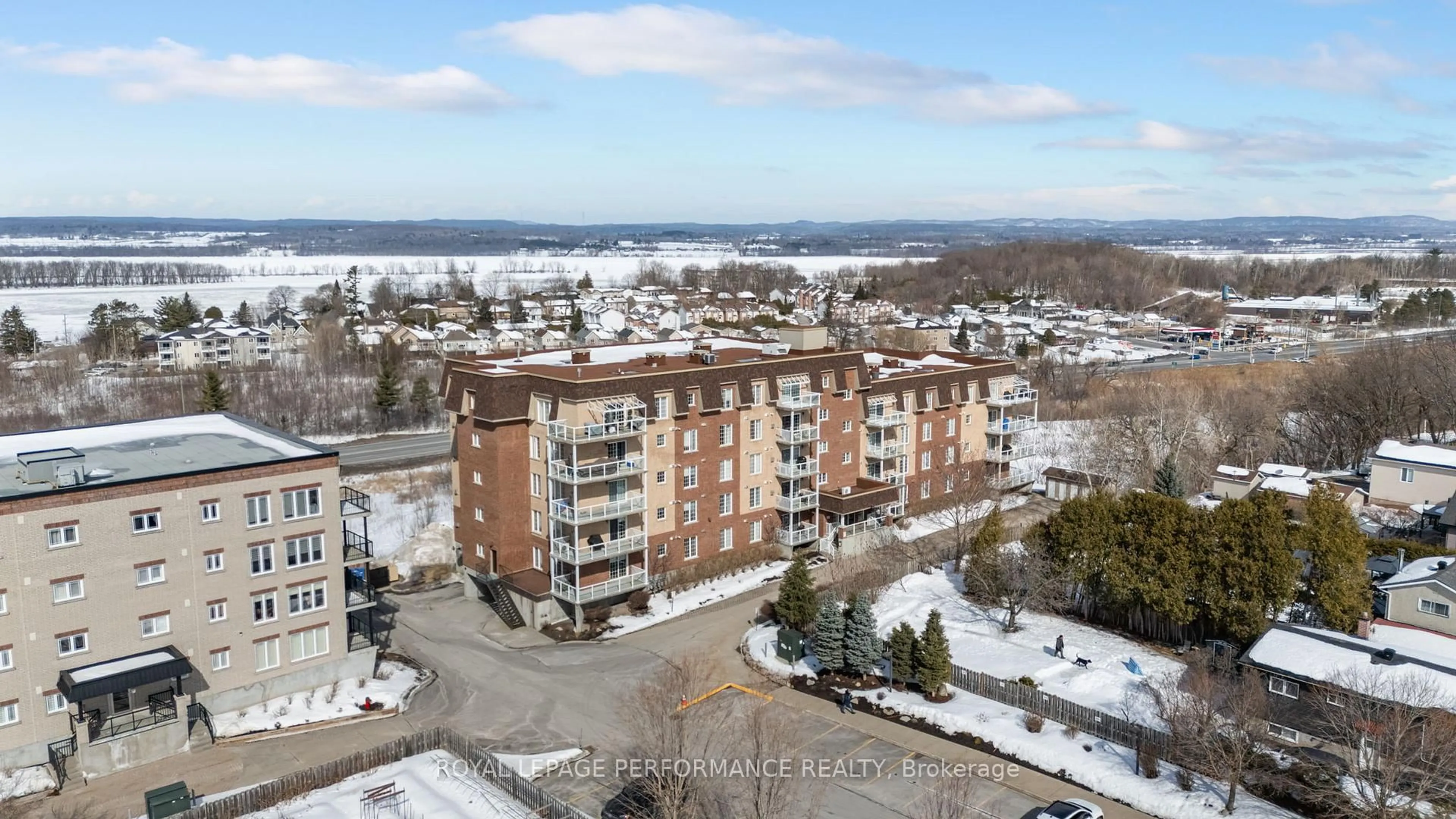 A pic from outside/outdoor area/front of a property/back of a property/a pic from drone, unknown for 2360 Albert St #206, Clarence-Rockland Ontario K4K 0C4
