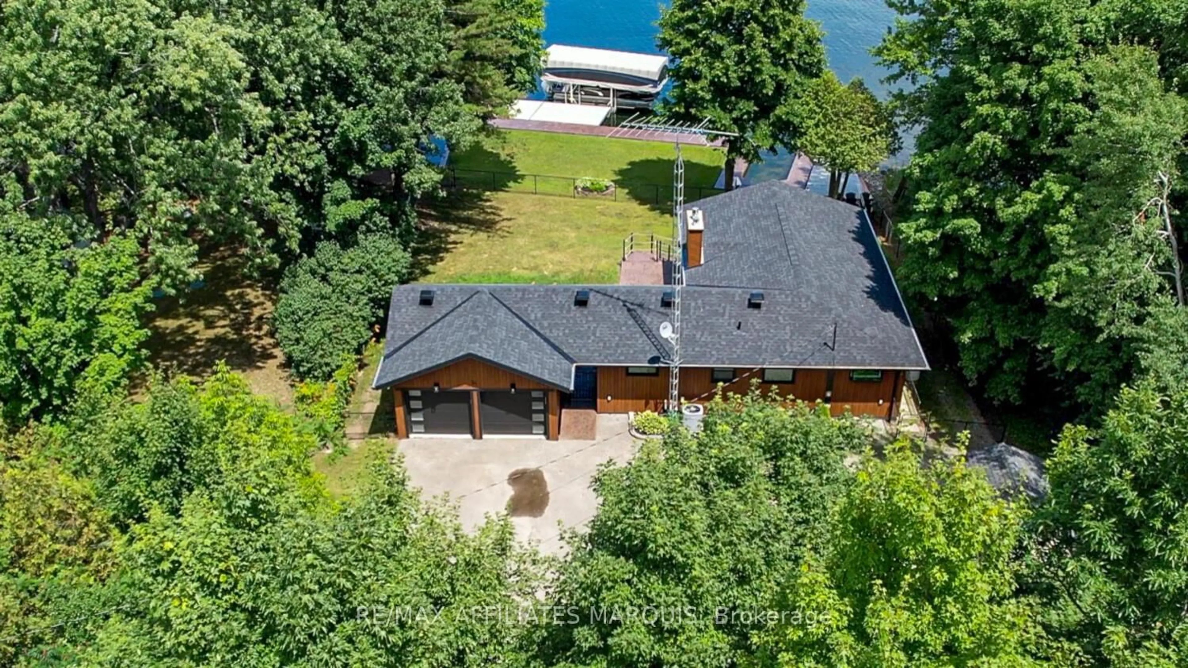 A pic from outside/outdoor area/front of a property/back of a property/a pic from drone, water/lake/river/ocean view for 34 R7 Rd, Rideau Lakes Ontario K0G 1L0