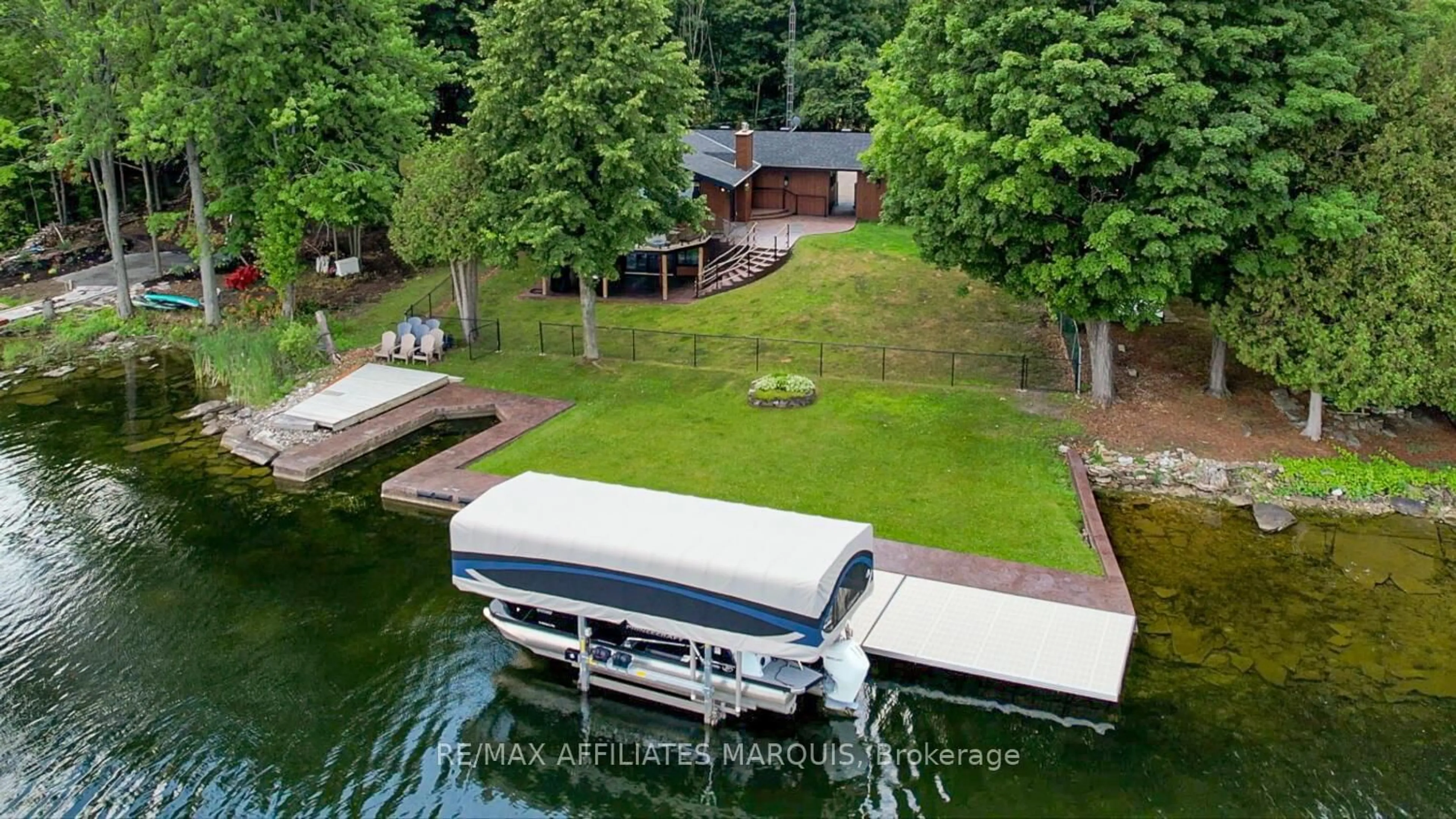 A pic from outside/outdoor area/front of a property/back of a property/a pic from drone, water/lake/river/ocean view for 34 R7 Rd, Rideau Lakes Ontario K0G 1L0