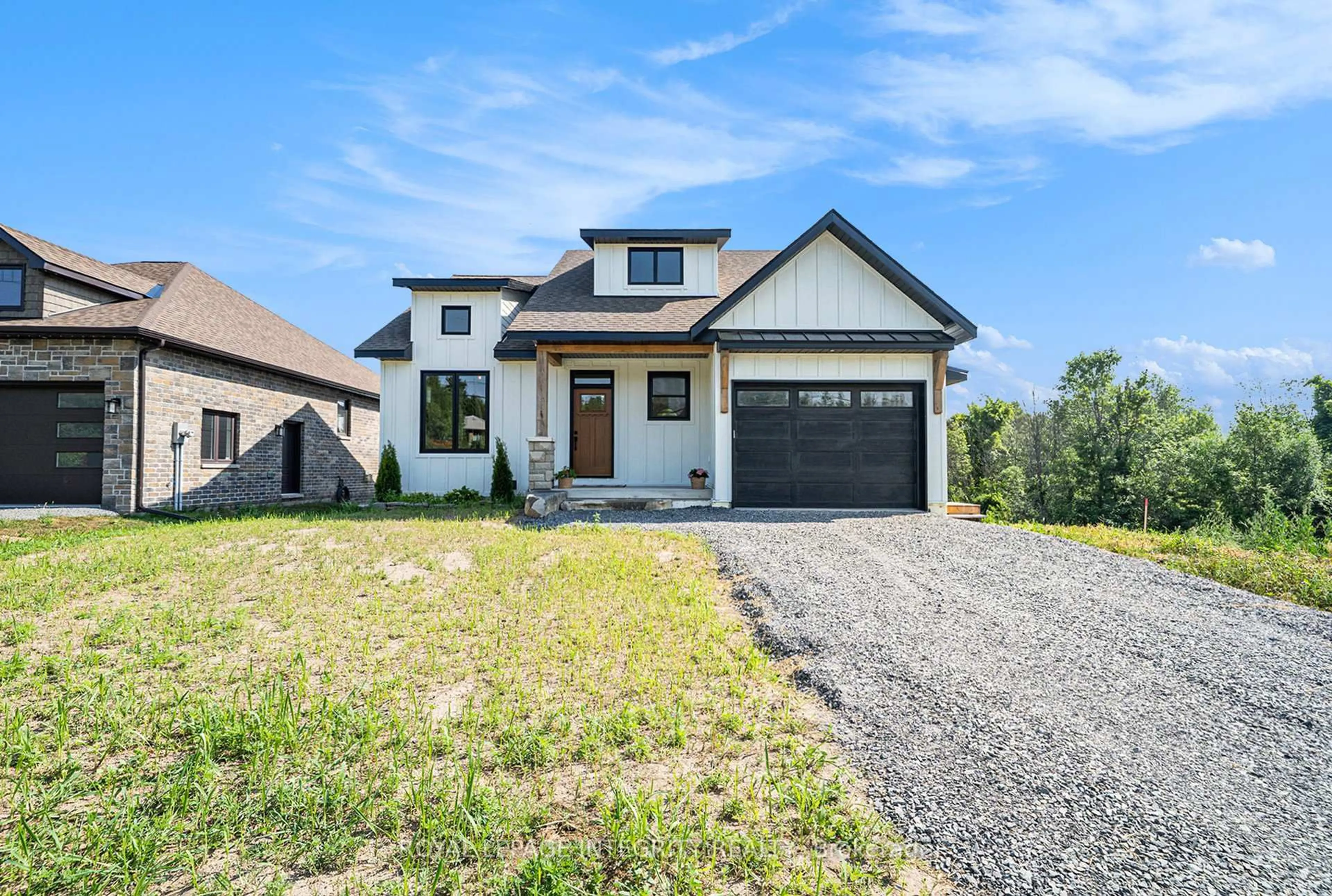 Home with brick exterior material, street for 29 Whittlers Cove Lane #2, Rideau Lakes Ontario K0G 1X0