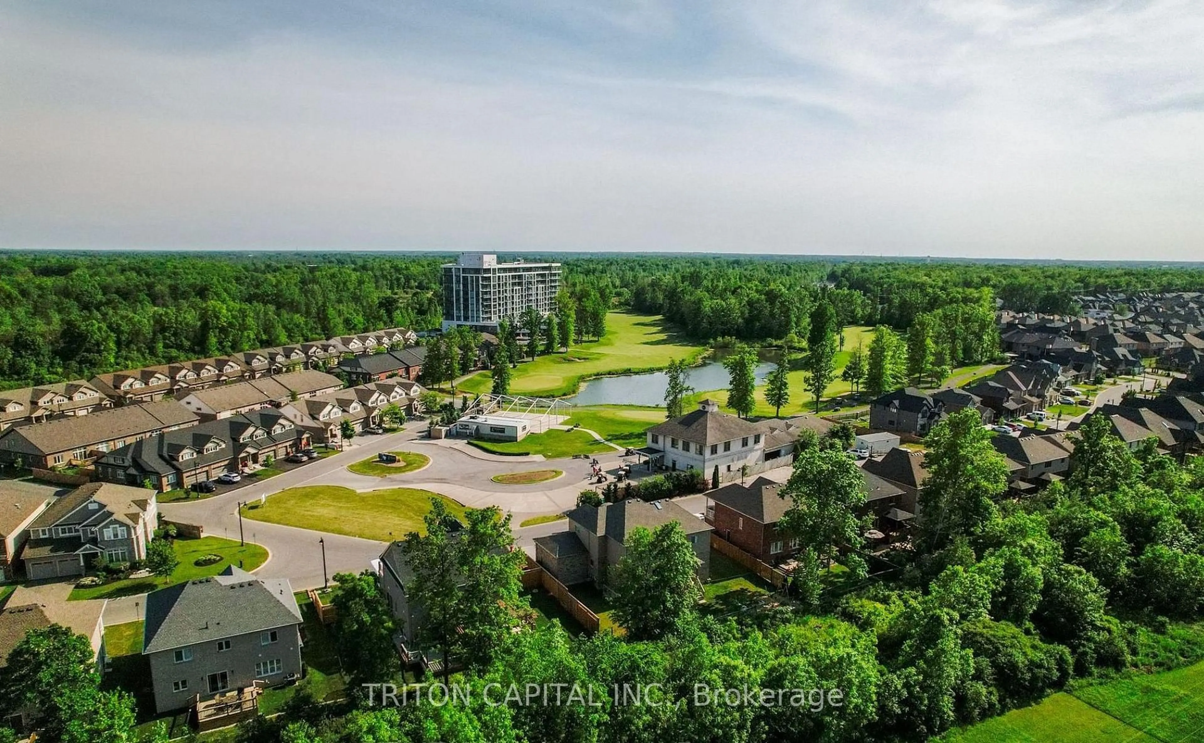 A pic from outside/outdoor area/front of a property/back of a property/a pic from drone, water/lake/river/ocean view for 7711 Green Vista Gate #1003, Niagara Falls Ontario L2G 0Y8