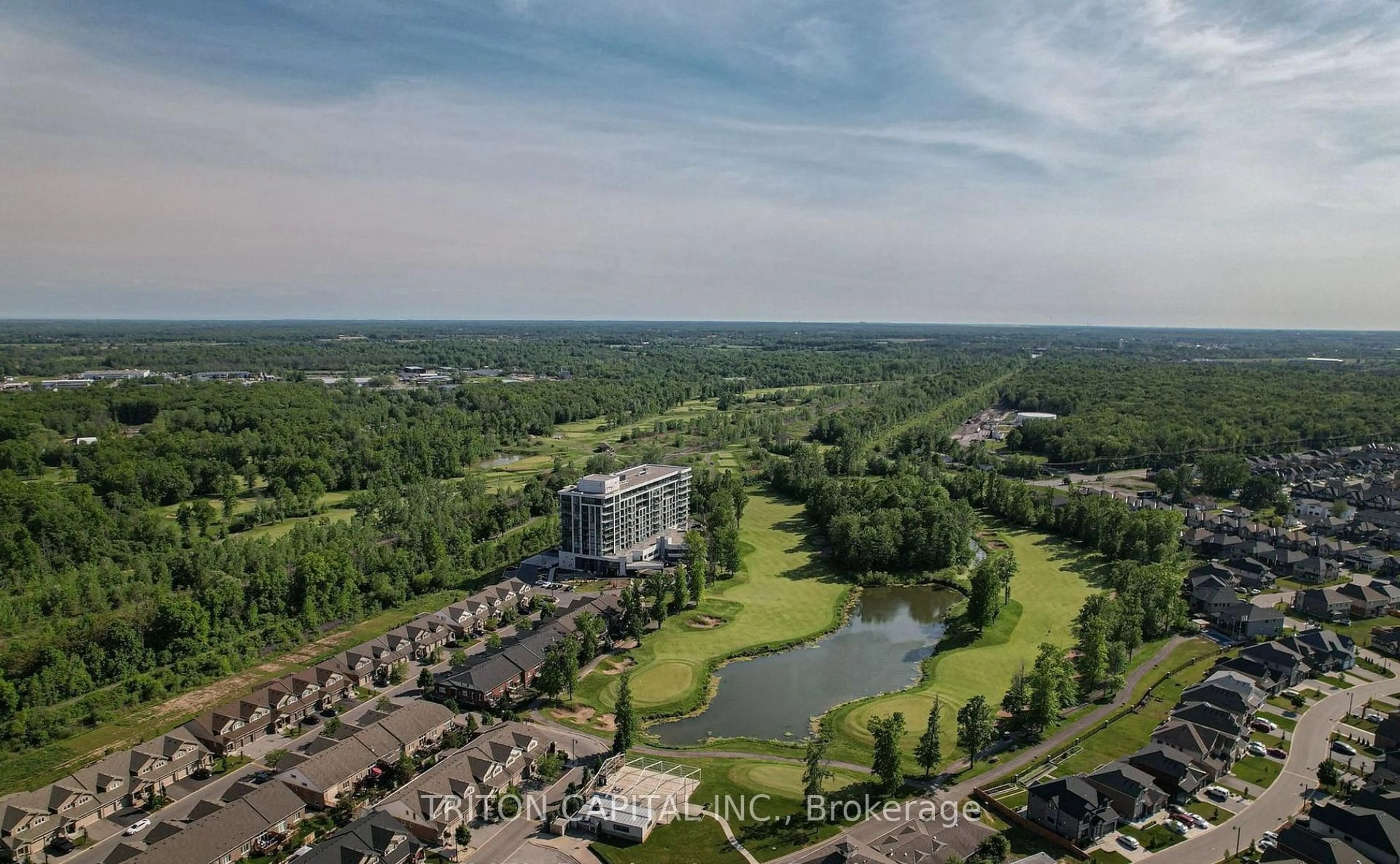 A pic from outside/outdoor area/front of a property/back of a property/a pic from drone, water/lake/river/ocean view for 7711 Green Vista Gate #1003, Niagara Falls Ontario L2G 0Y8