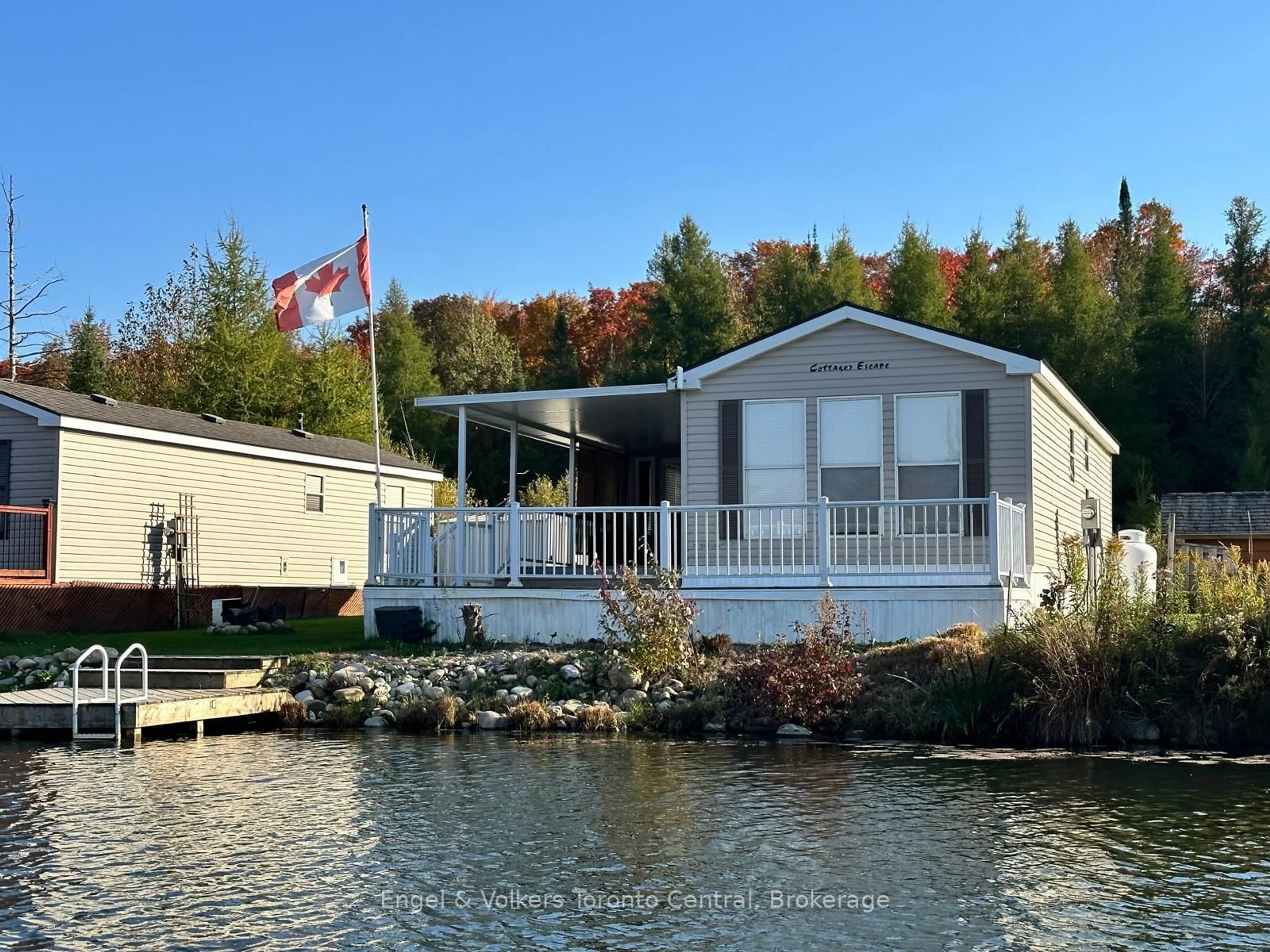 Home with vinyl exterior material, water/lake/river/ocean view for 7489 SIDEROAD 5 #T103, Wellington North Ontario N0G 2L0