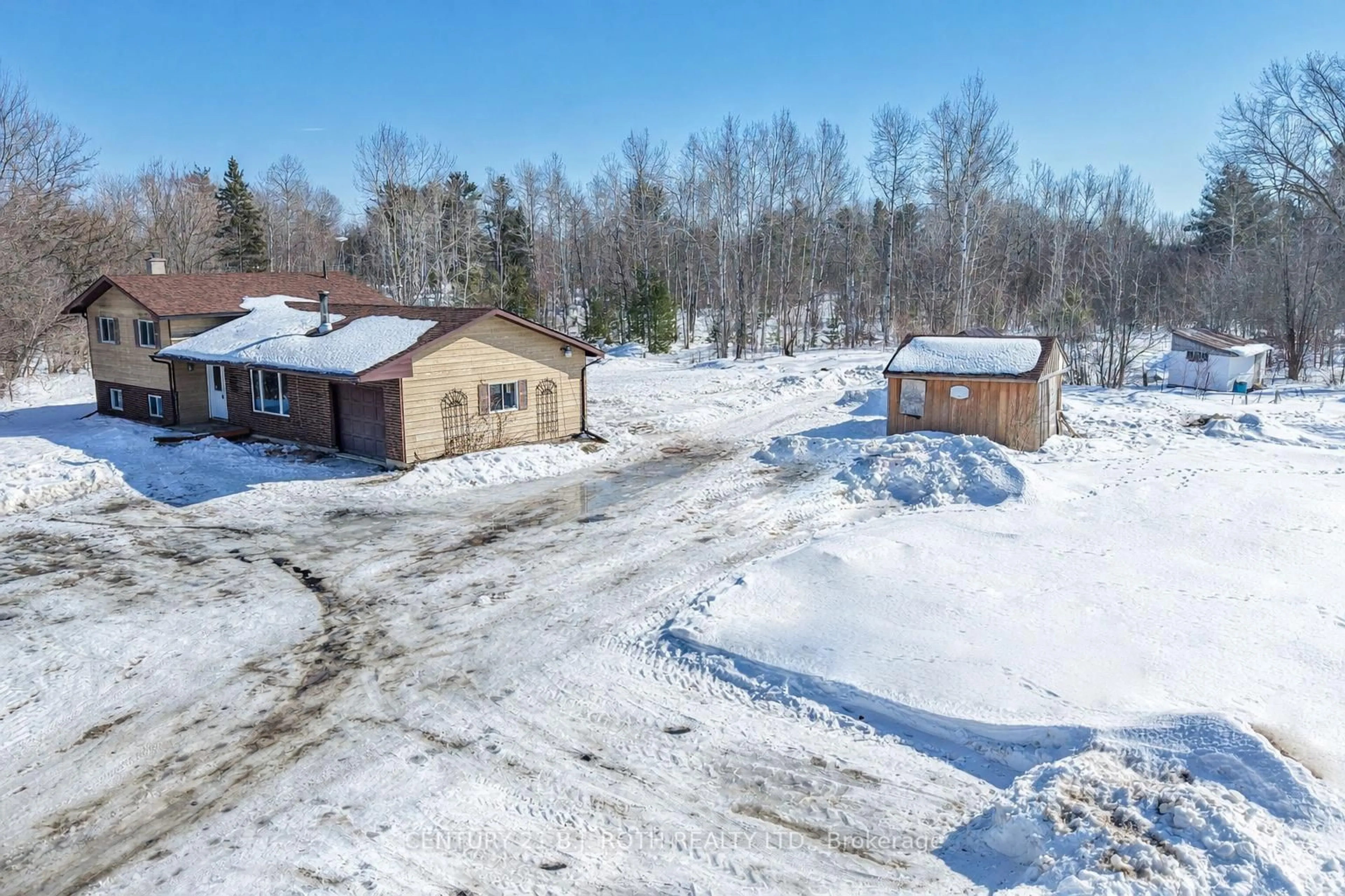 A pic from outside/outdoor area/front of a property/back of a property/a pic from drone, unknown for 374 Monck Rd, Kawartha Lakes Ontario L0K 1W0