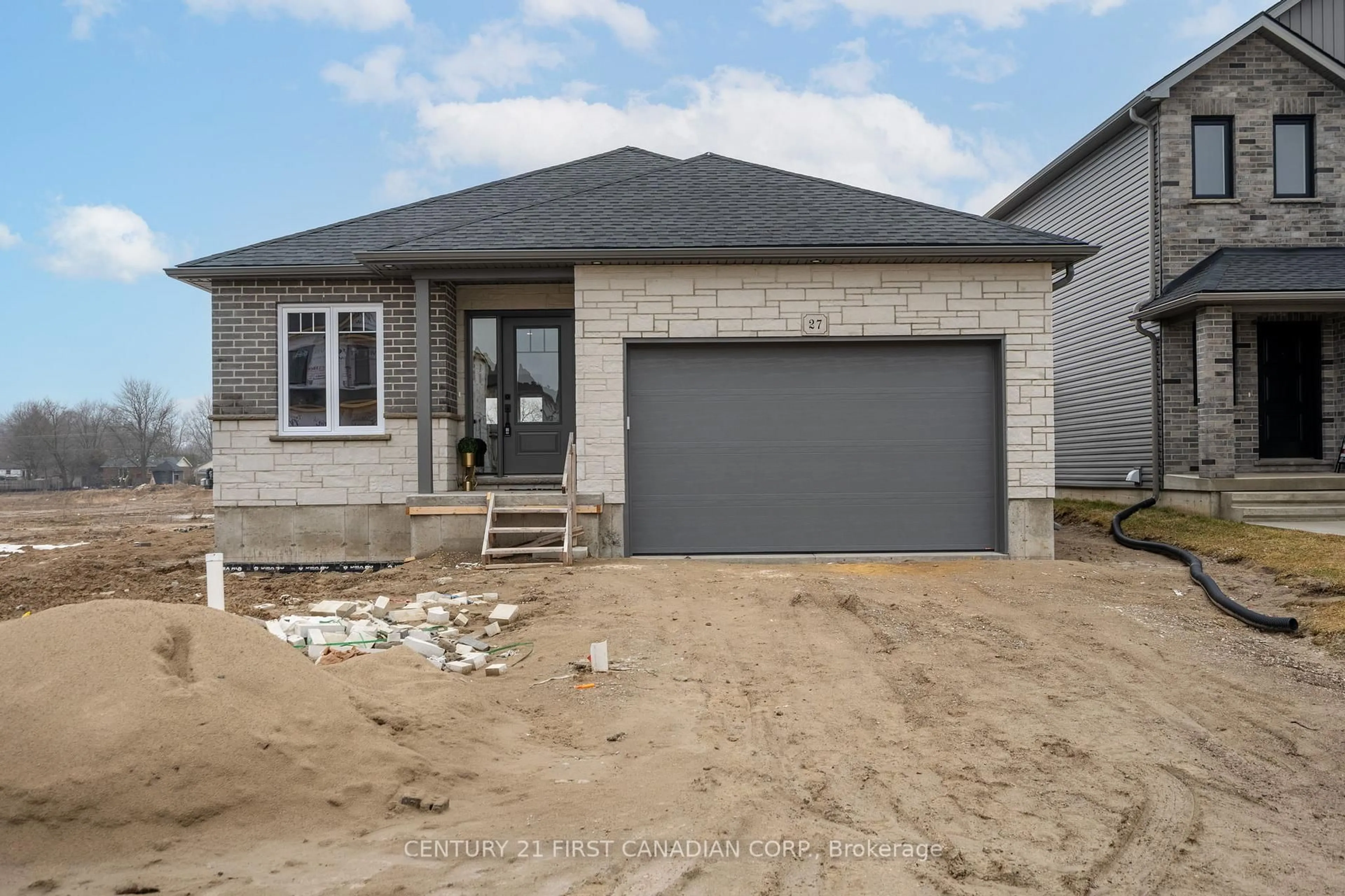 Home with brick exterior material, street for 27 Sheldabren St, North Middlesex Ontario N0M 1A0