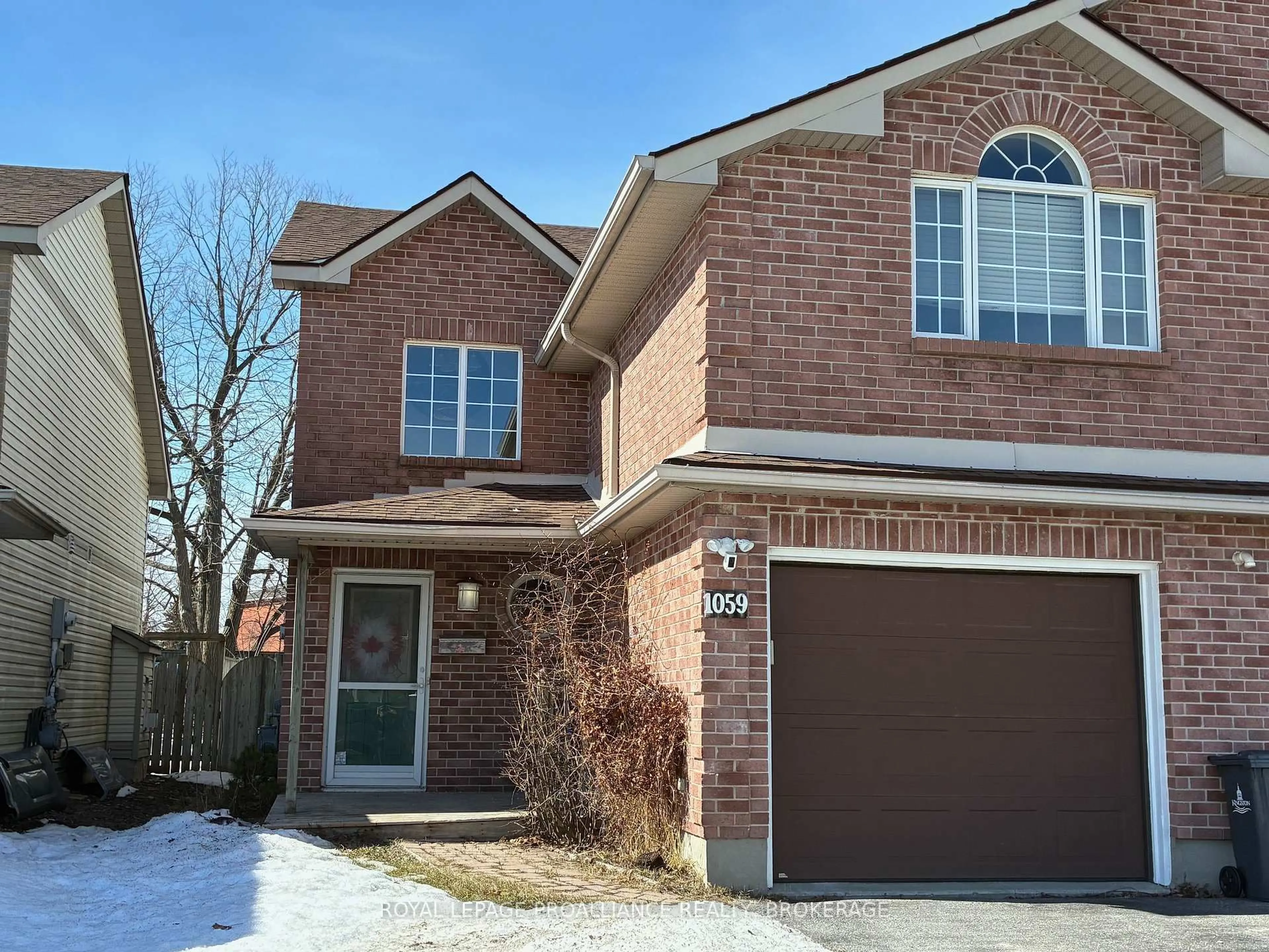 Home with brick exterior material, street for 1059 Springfield Dr, Kingston Ontario K7M 8V6