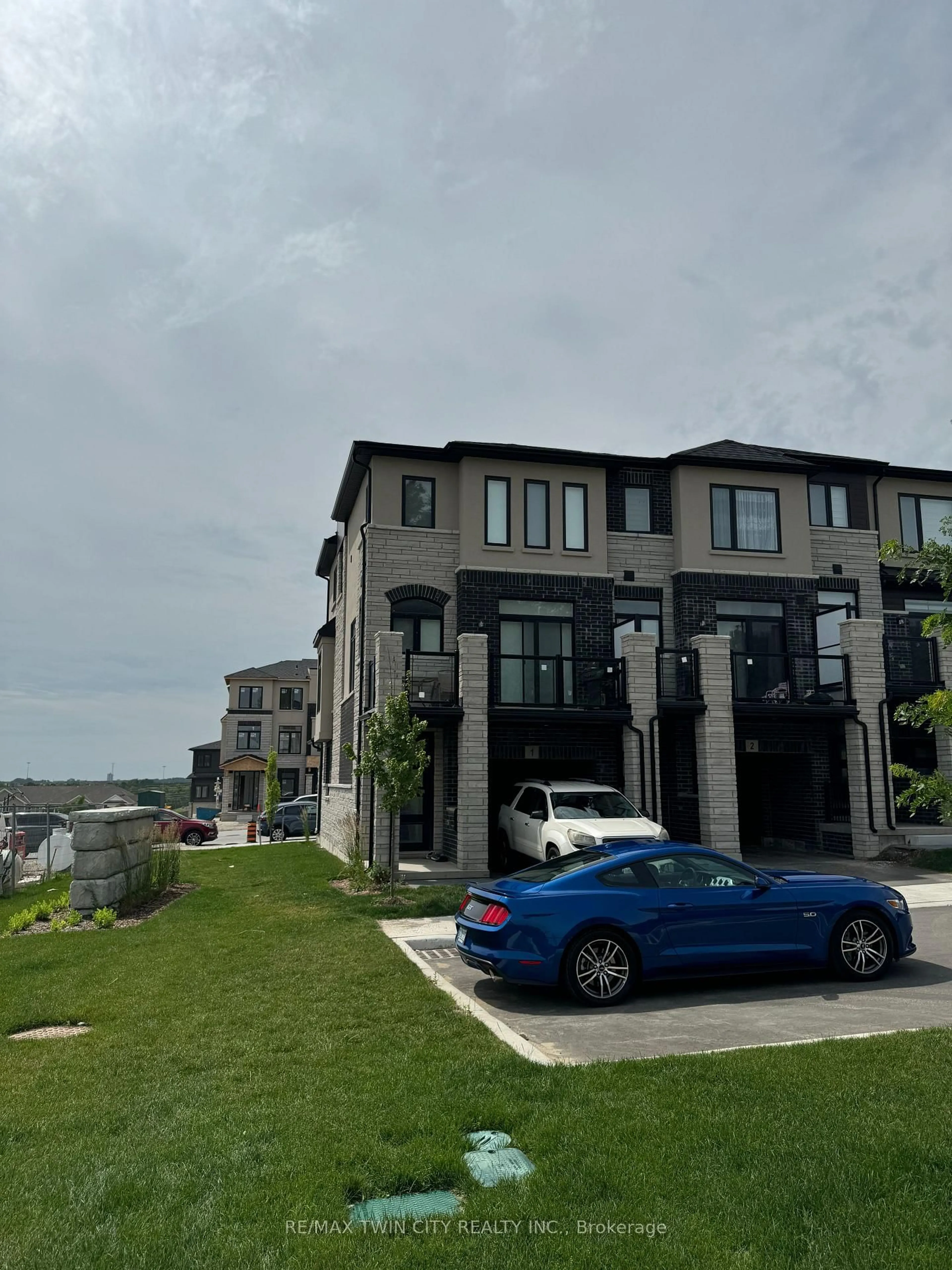 A pic from outside/outdoor area/front of a property/back of a property/a pic from drone, unknown for 290 Equestrian Way #1, Cambridge Ontario N3E 0E7