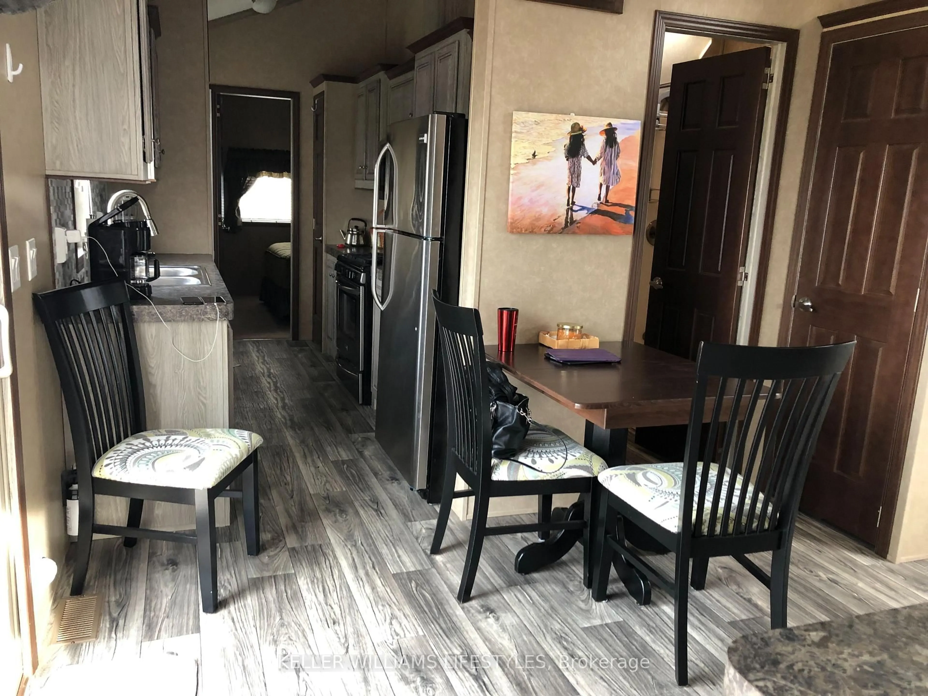 Dining room, wood/laminate floor for 77719 Bluewater Highway #4, Bluewater Ontario N0M 1G0