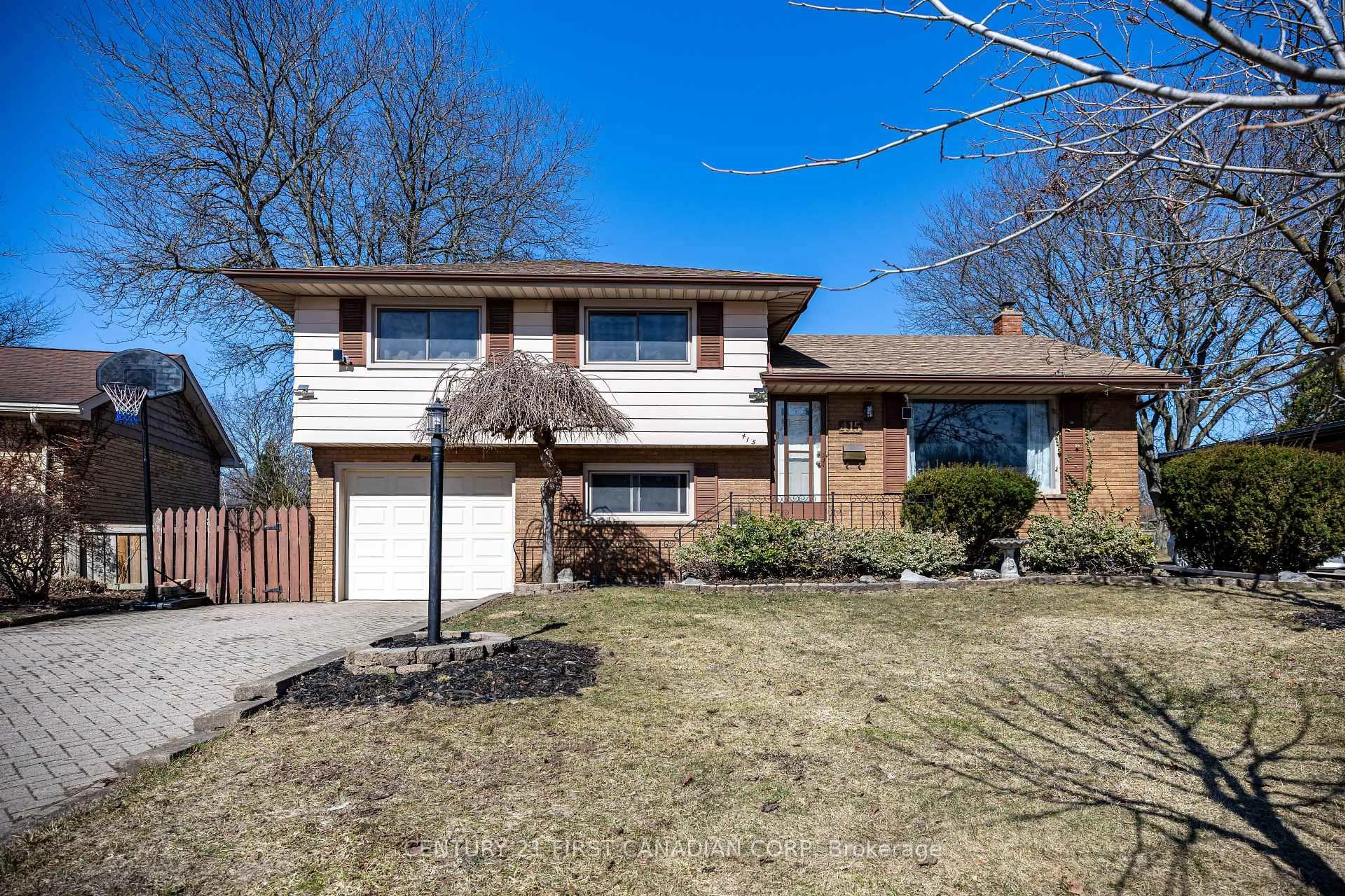 Home with brick exterior material, street for 415 Regal Dr, London East Ontario N5Y 1J8