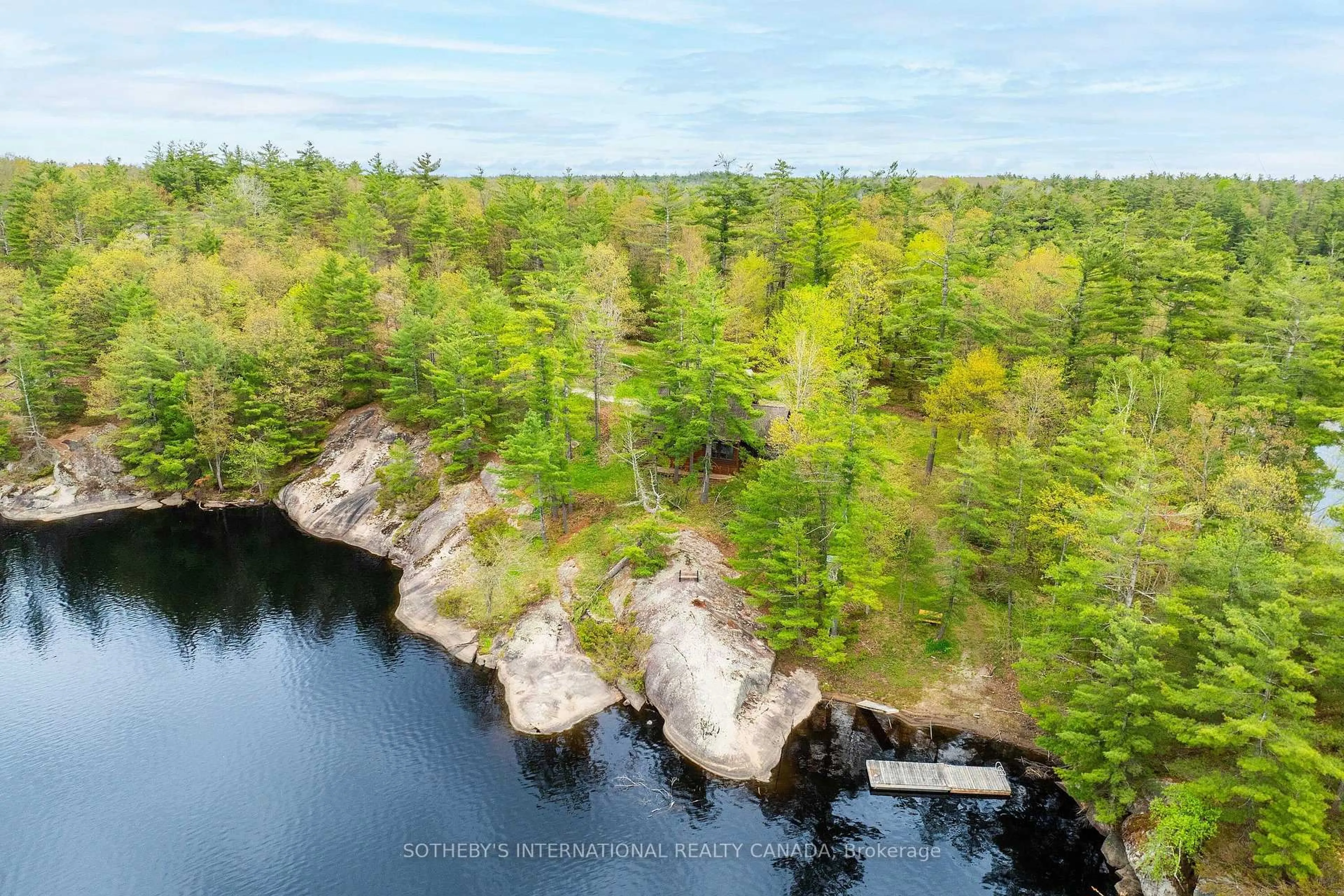 A pic from outside/outdoor area/front of a property/back of a property/a pic from drone, water/lake/river/ocean view for 1074 Cooks Rd, Gravenhurst Ontario P1P 1R3