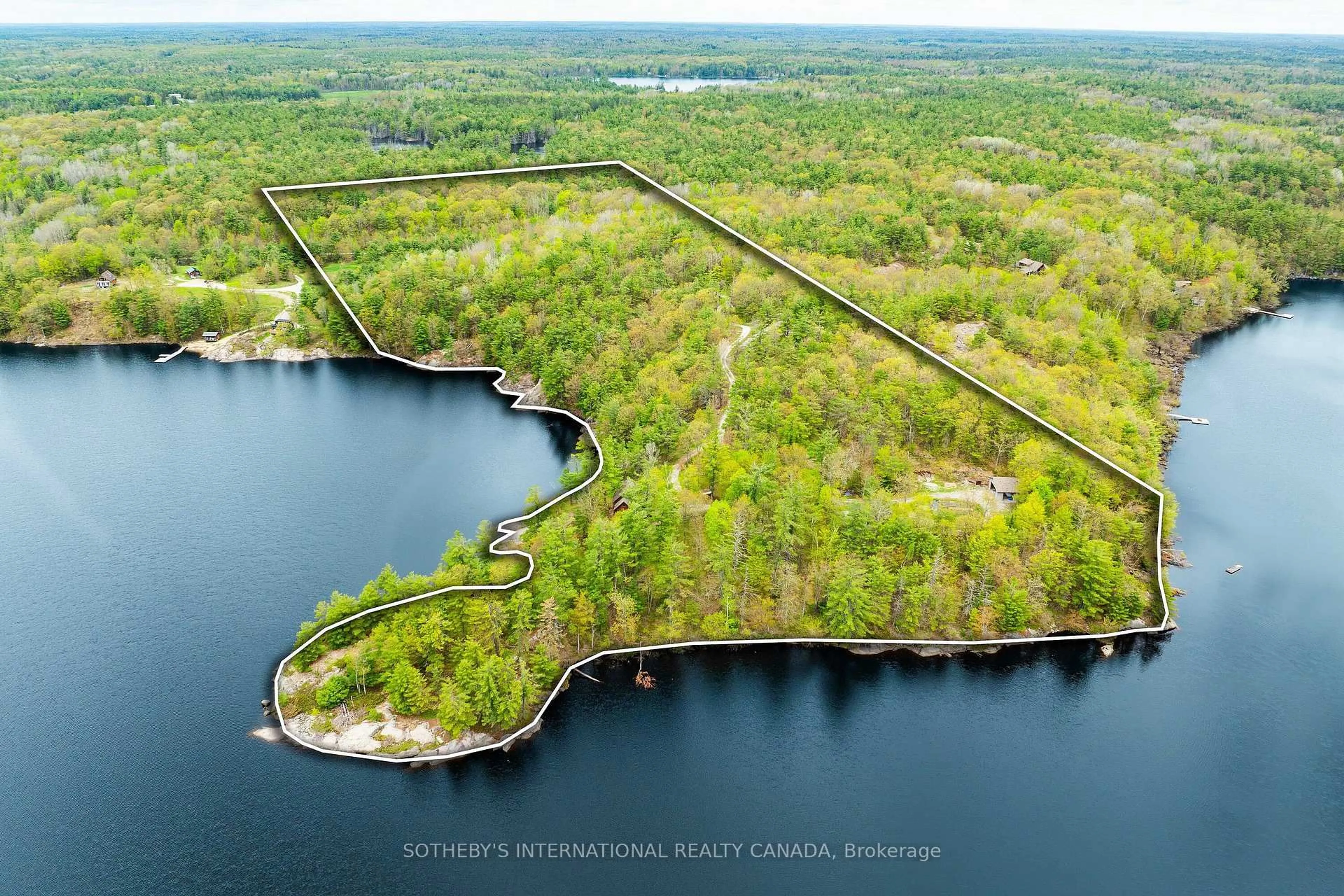 A pic from outside/outdoor area/front of a property/back of a property/a pic from drone, water/lake/river/ocean view for 1074 Cooks Rd, Gravenhurst Ontario P1P 1R3