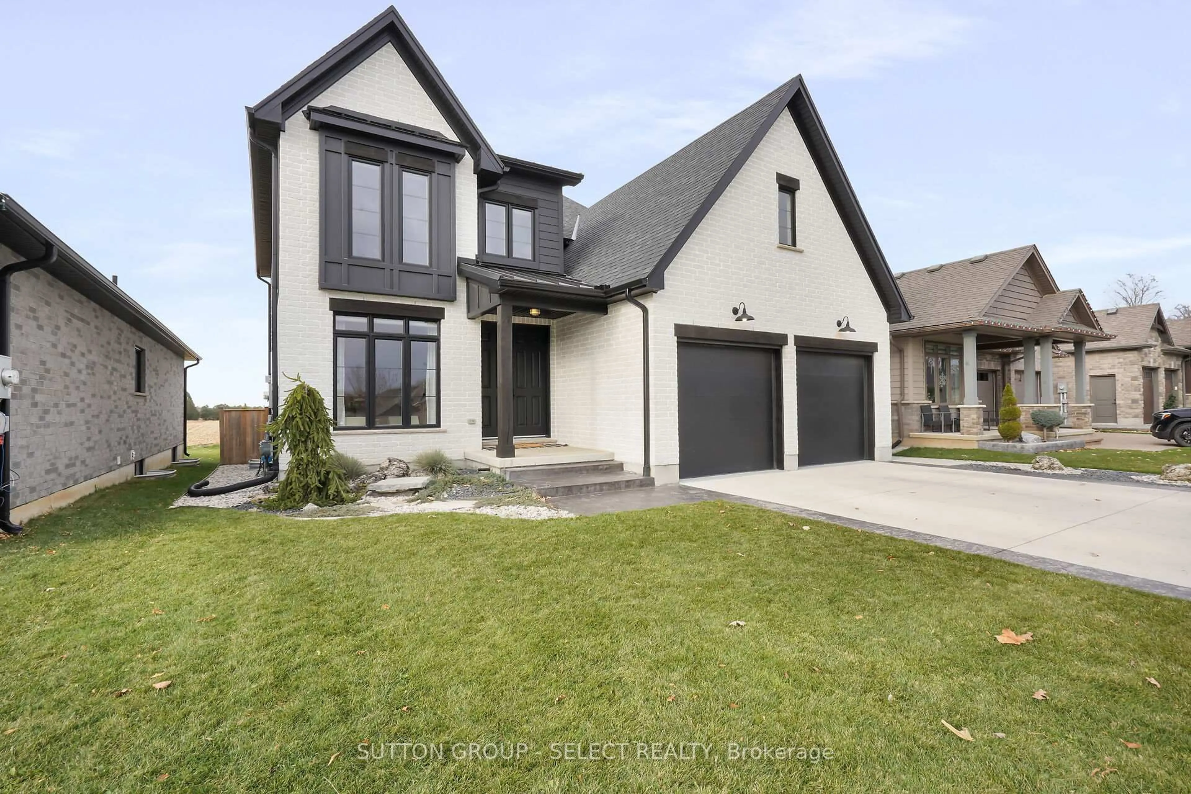 Home with brick exterior material, street for 173 Collins Way, Strathroy-Caradoc Ontario N7G 0G2