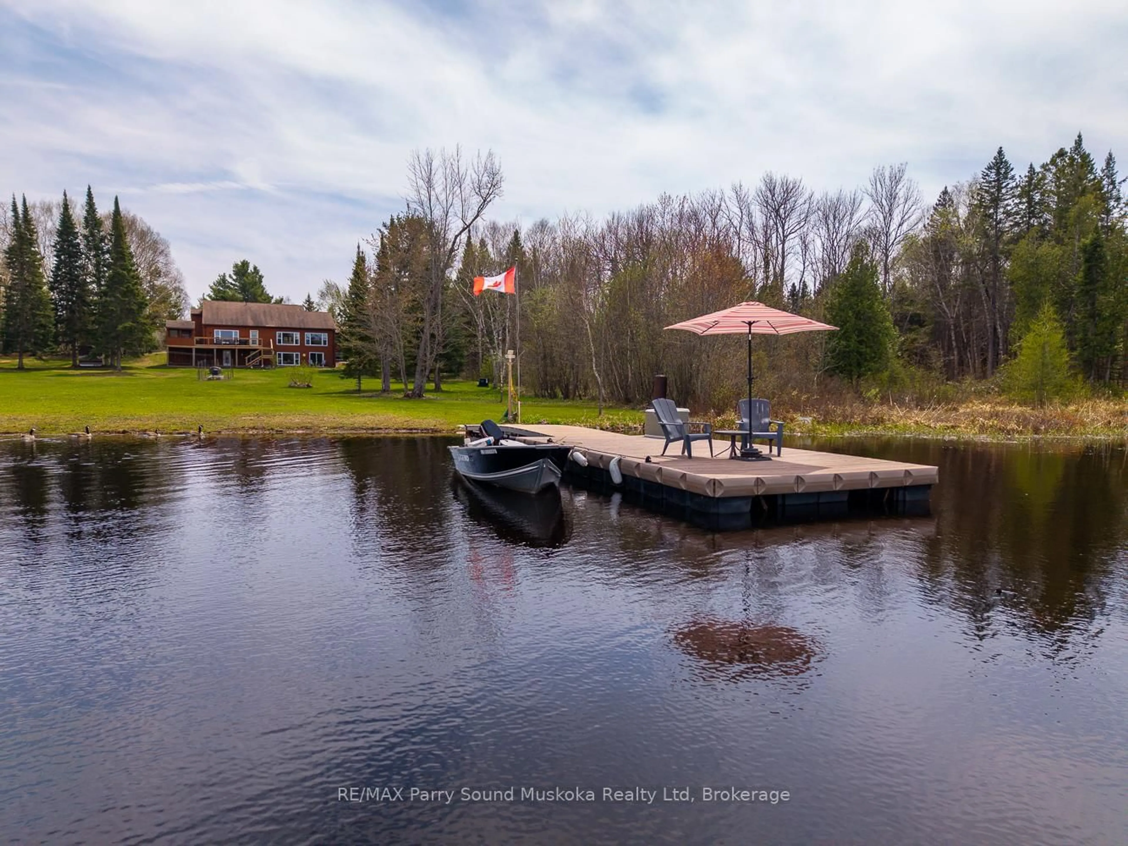A pic from outside/outdoor area/front of a property/back of a property/a pic from drone, water/lake/river/ocean view for 258 Lakeside Tr, Magnetawan Ontario P0A 1P0