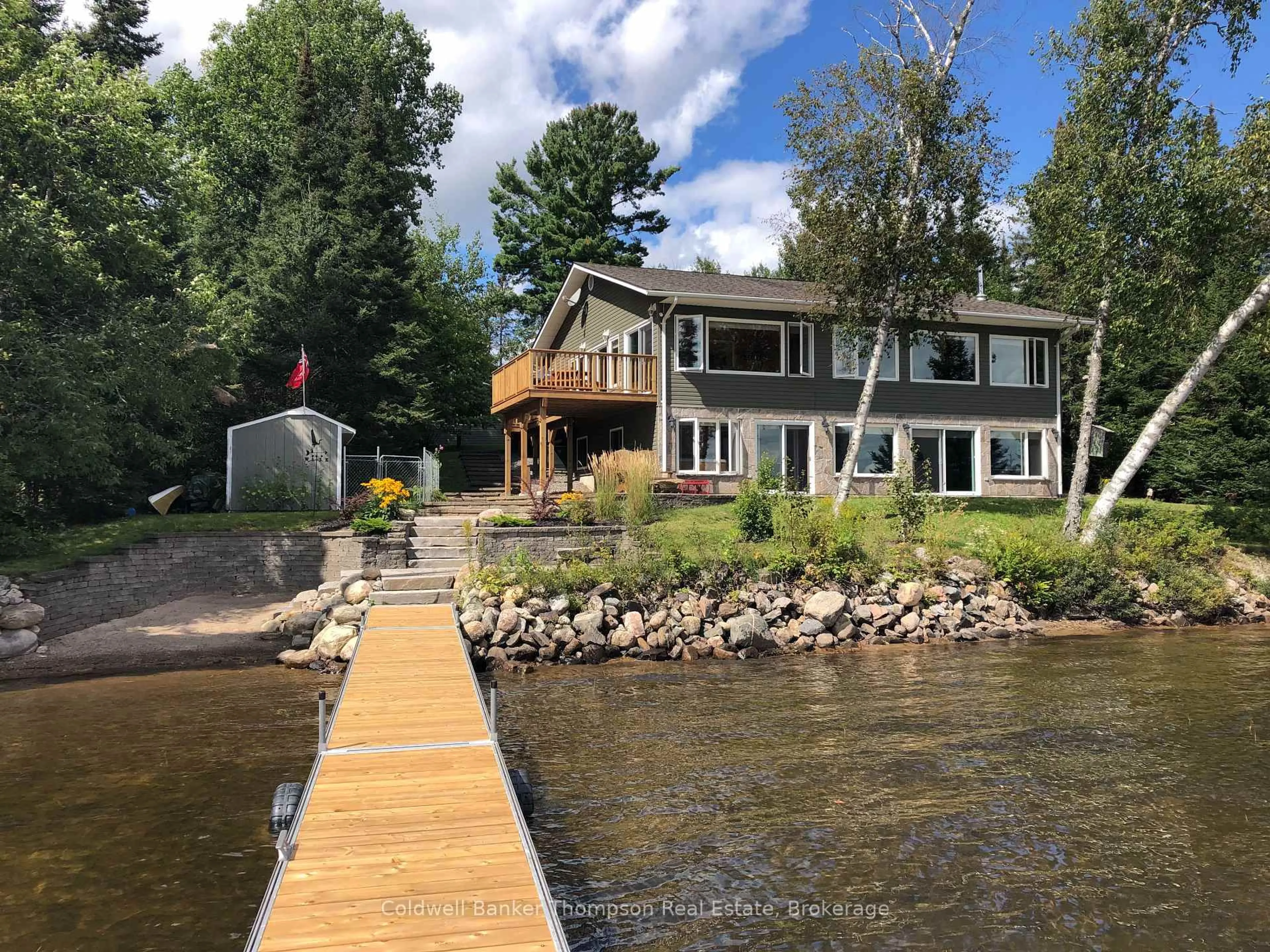 A pic from outside/outdoor area/front of a property/back of a property/a pic from drone, water/lake/river/ocean view for 41 MACHAR Cres, Machar Ontario P0A 1X0