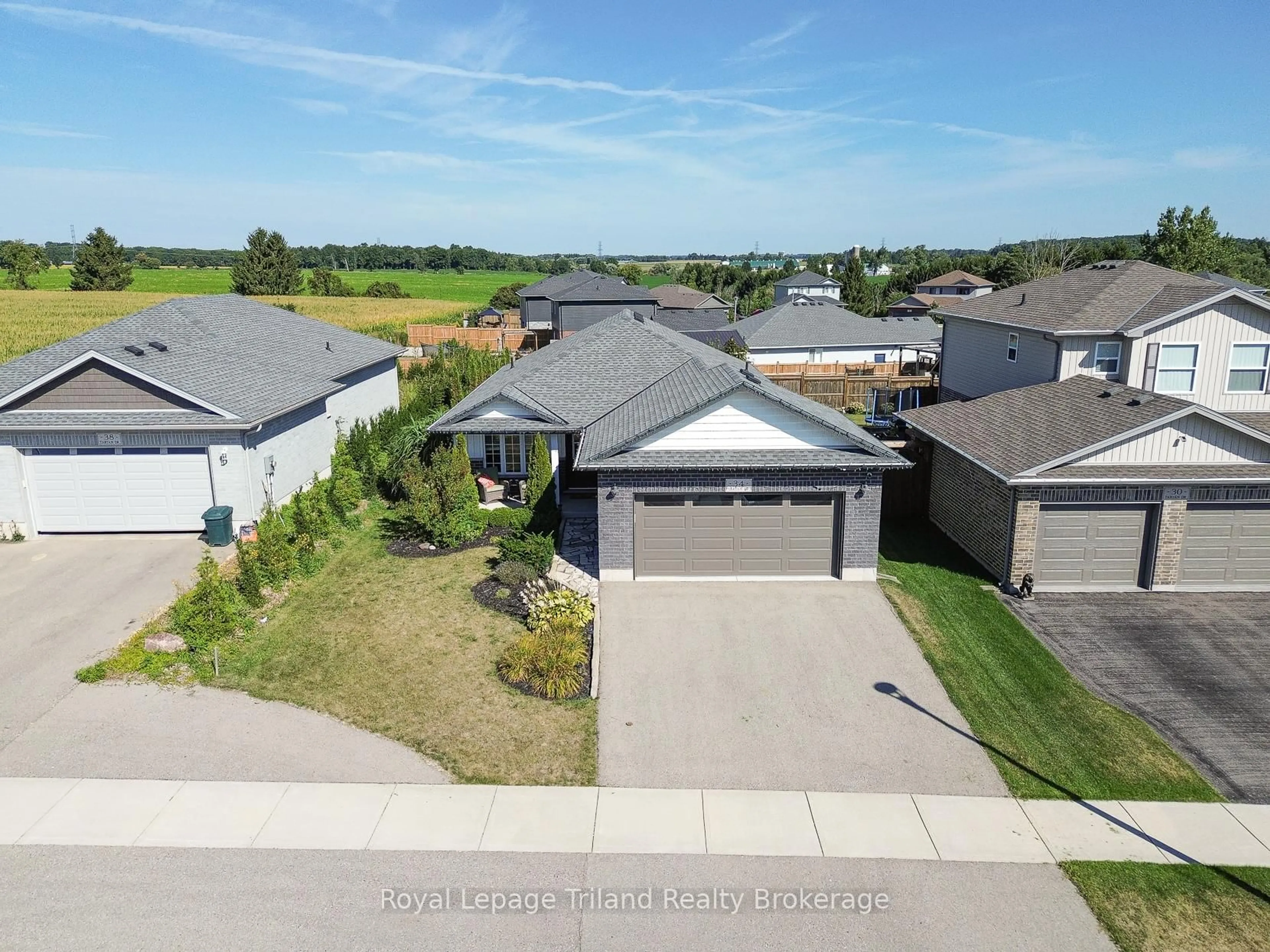 A pic from outside/outdoor area/front of a property/back of a property/a pic from drone, unknown for 34 Tartan Dr, Zorra Ontario N0J 1J0