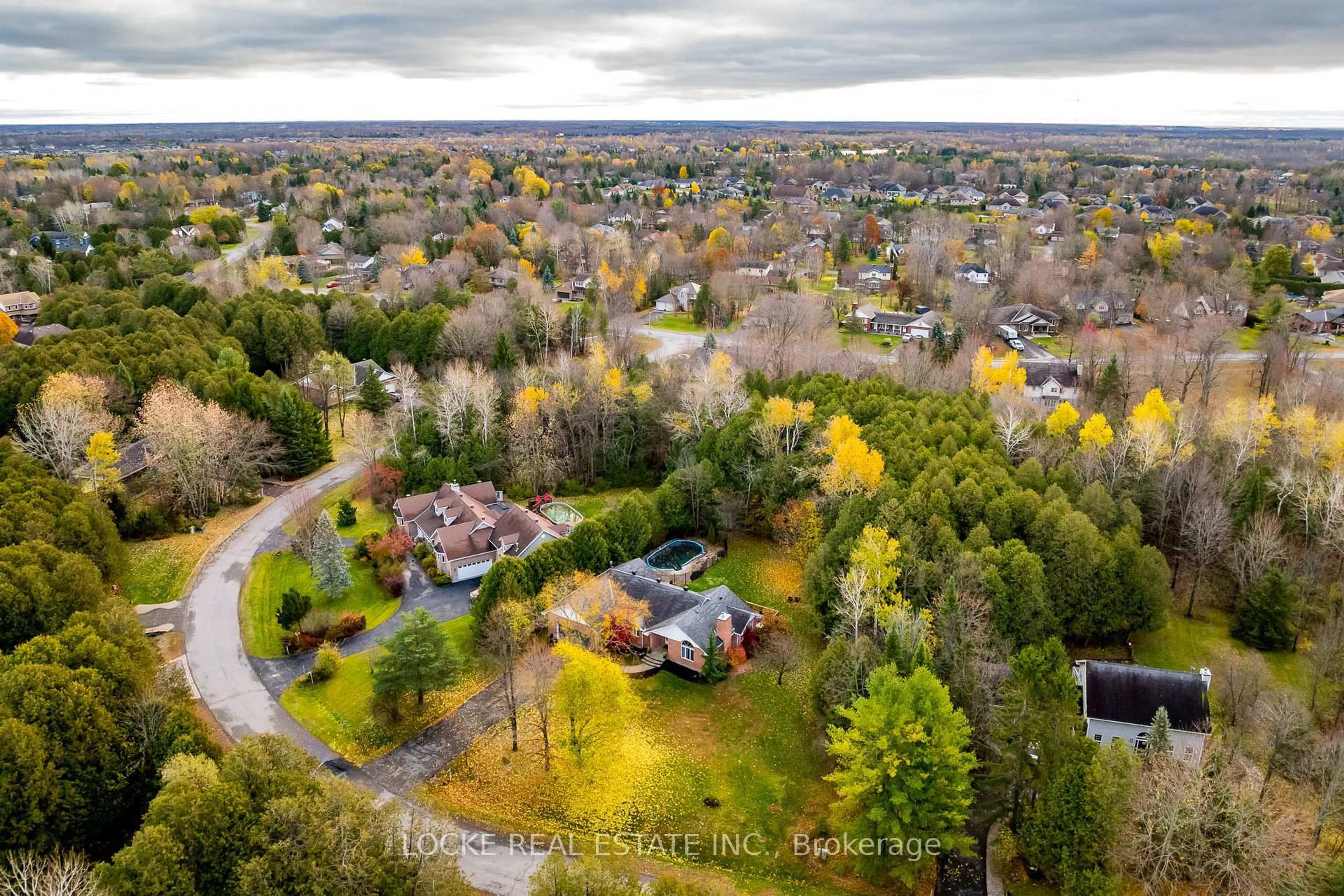 A pic from outside/outdoor area/front of a property/back of a property/a pic from drone, forest/trees view for 6492 Waddion Dr, Ottawa Ontario K4P 1E7