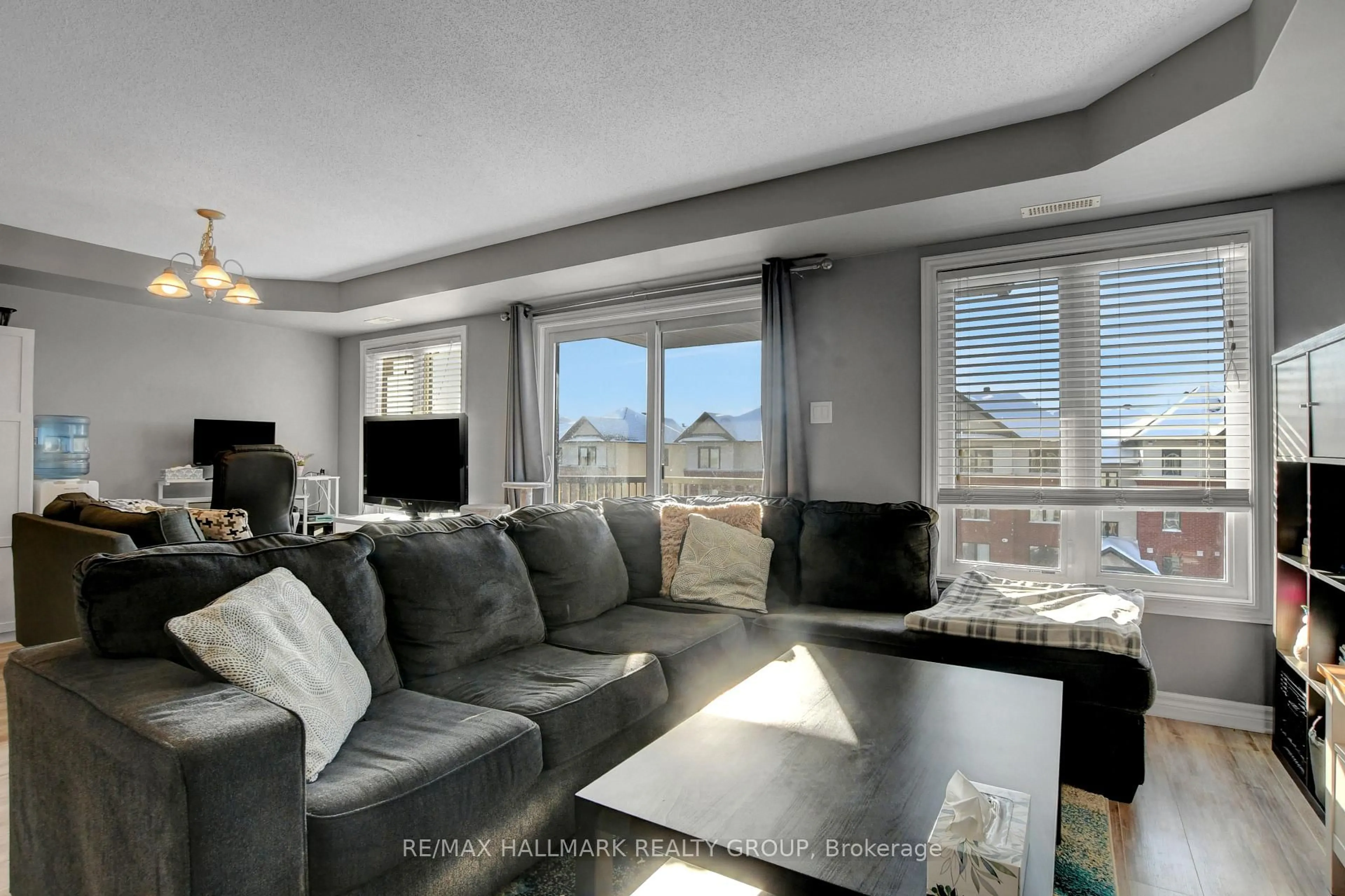 Living room with furniture, unknown for 2210 Tenth Line Rd #8, Ottawa Ontario K4A 0X7