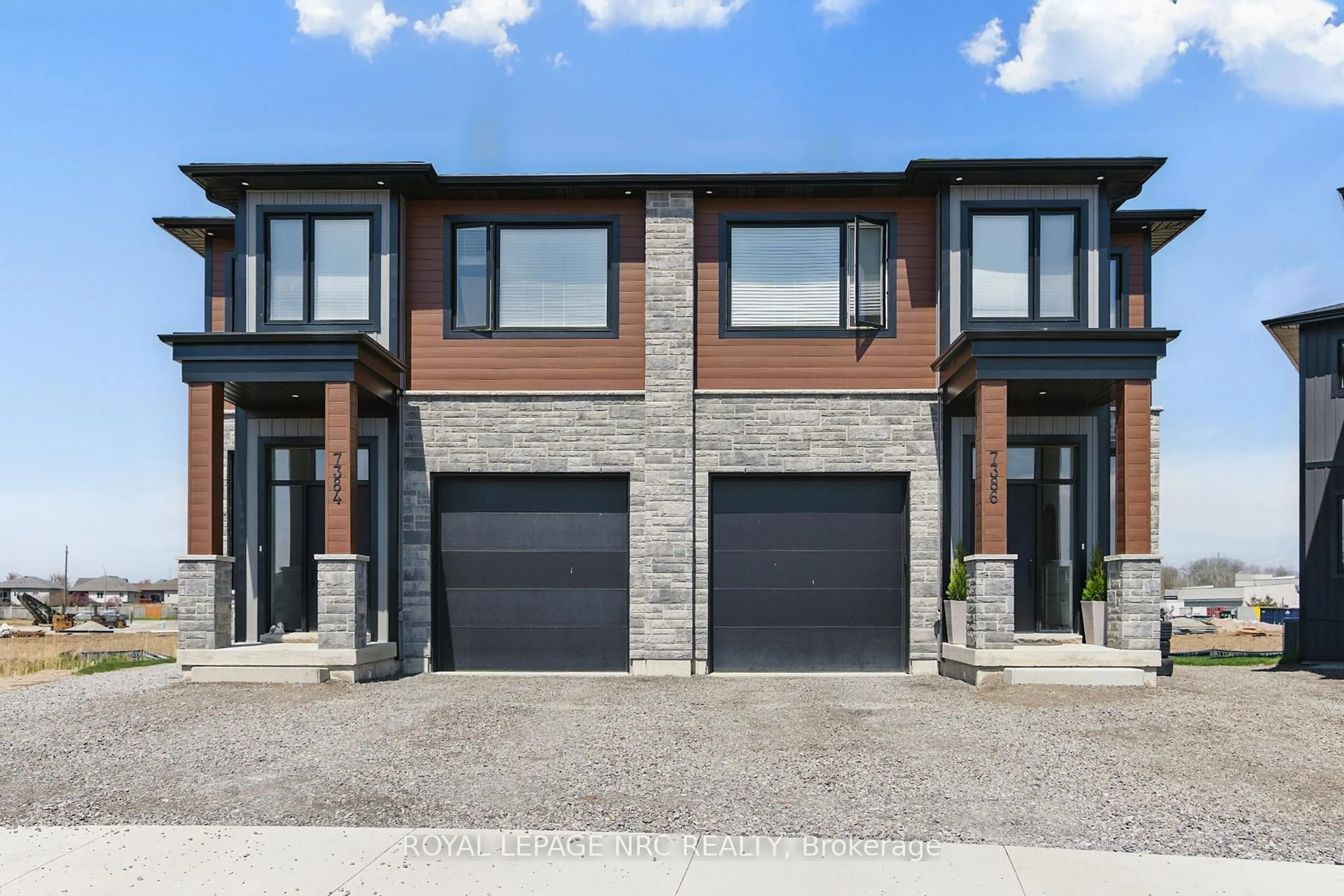 Home with brick exterior material, street for 7384 Splendour Dr, Niagara Falls Ontario L2H 3V8