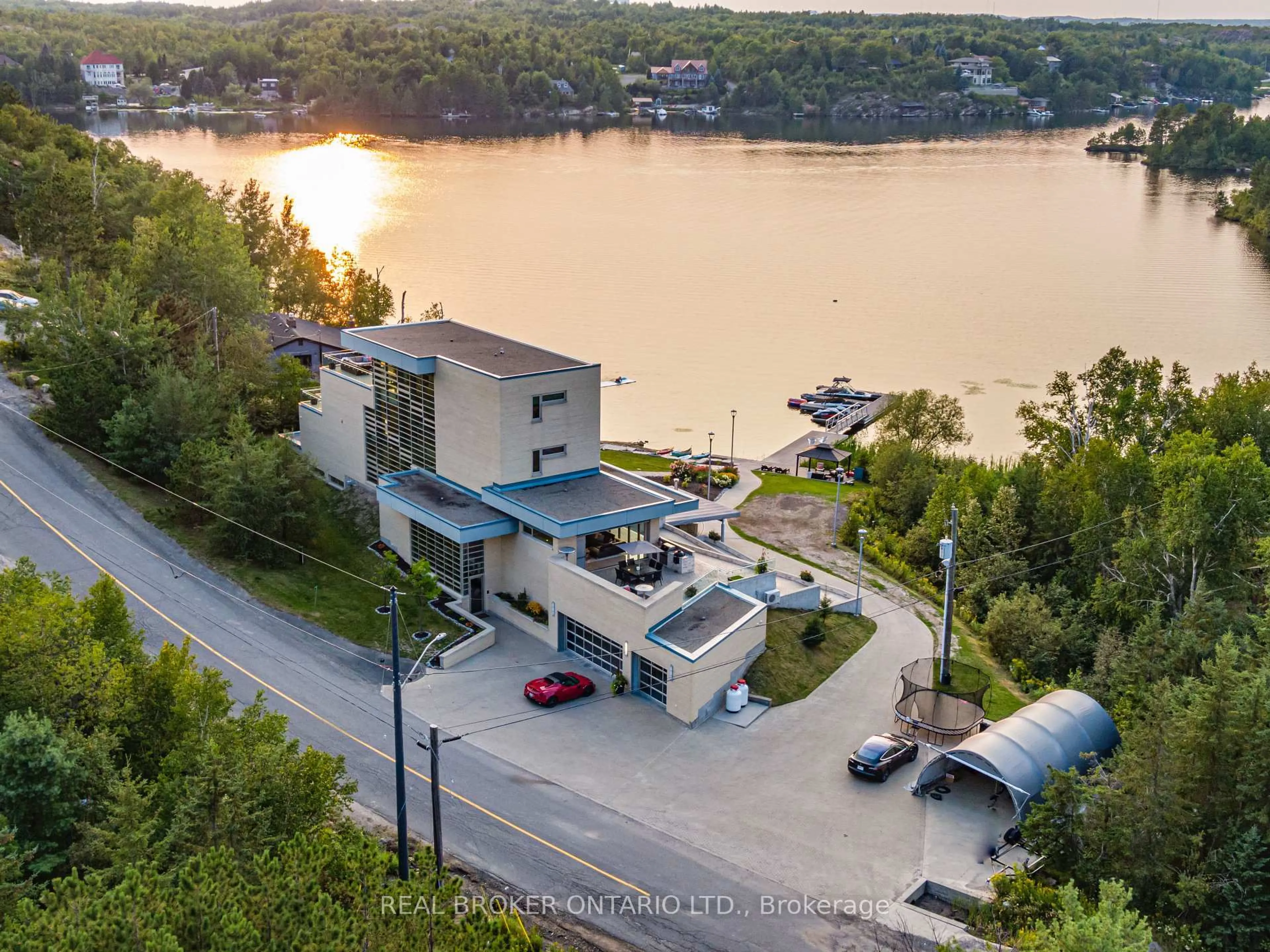 A pic from outside/outdoor area/front of a property/back of a property/a pic from drone, water/lake/river/ocean view for 2410 South Bay Rd, Greater Sudbury Ontario P3E 6H7