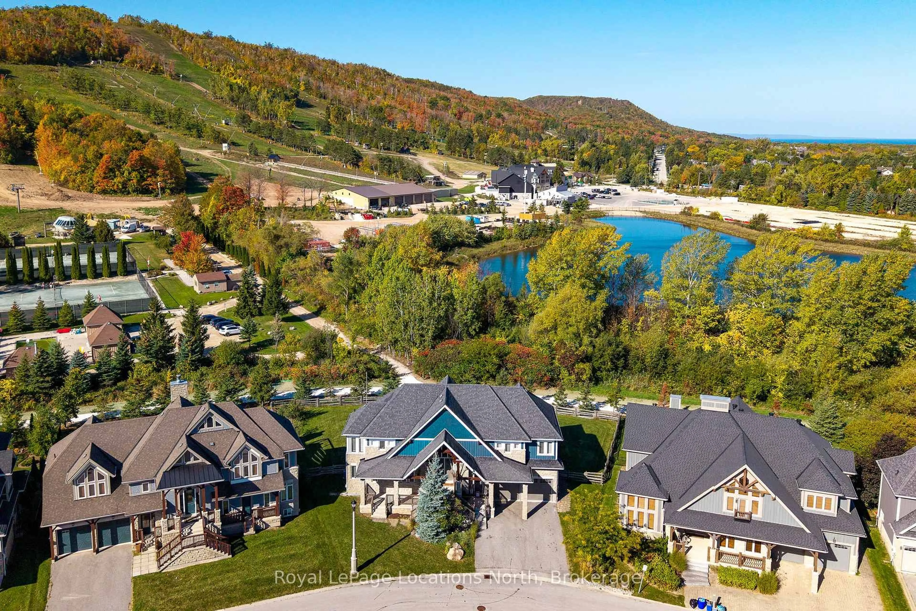 A pic from outside/outdoor area/front of a property/back of a property/a pic from drone, water/lake/river/ocean view for 173 National Dr, Blue Mountains Ontario L9Y 0B5